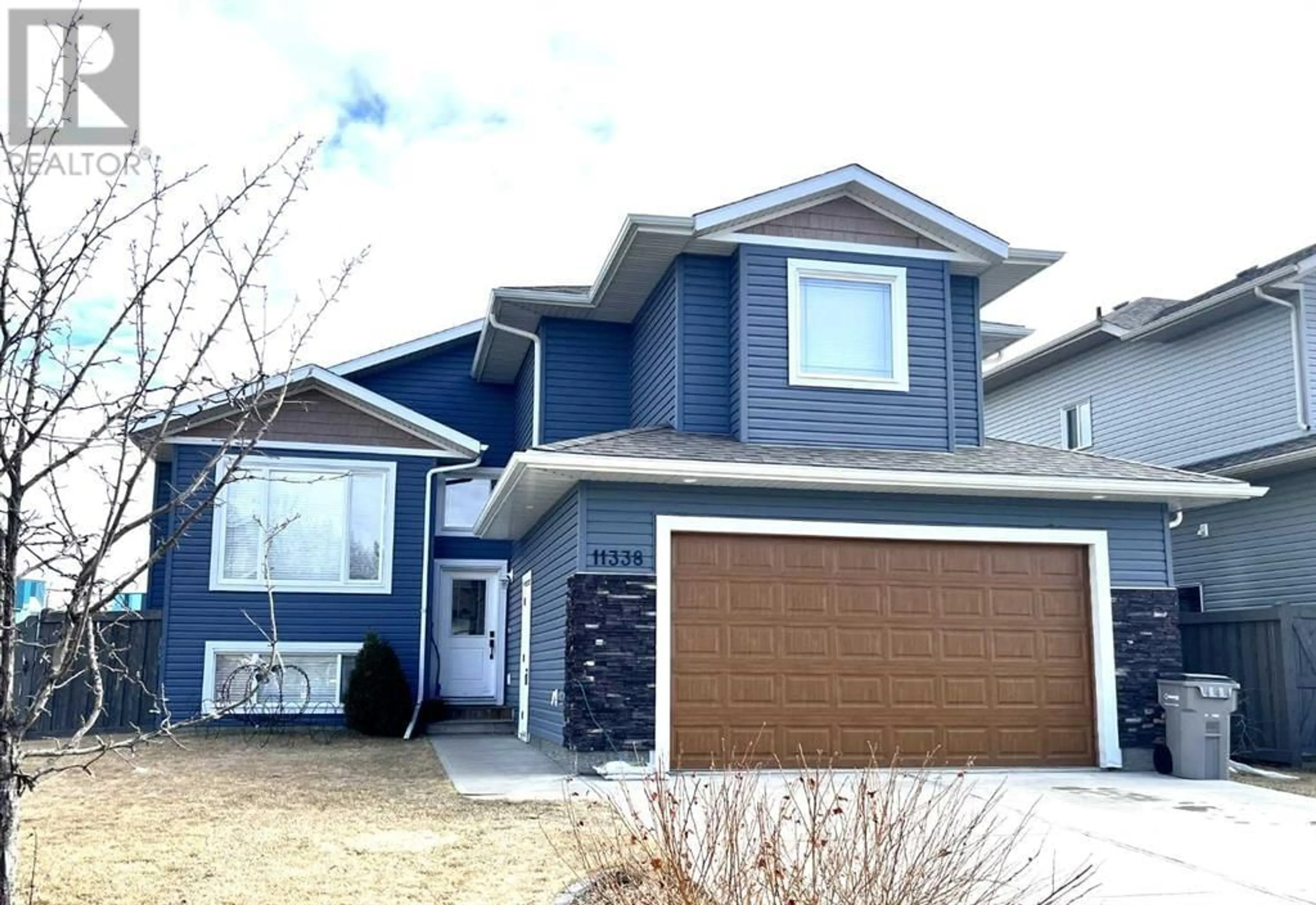 Frontside or backside of a home for 11338 59 Avenue, Grande Prairie Alberta T8W0L2