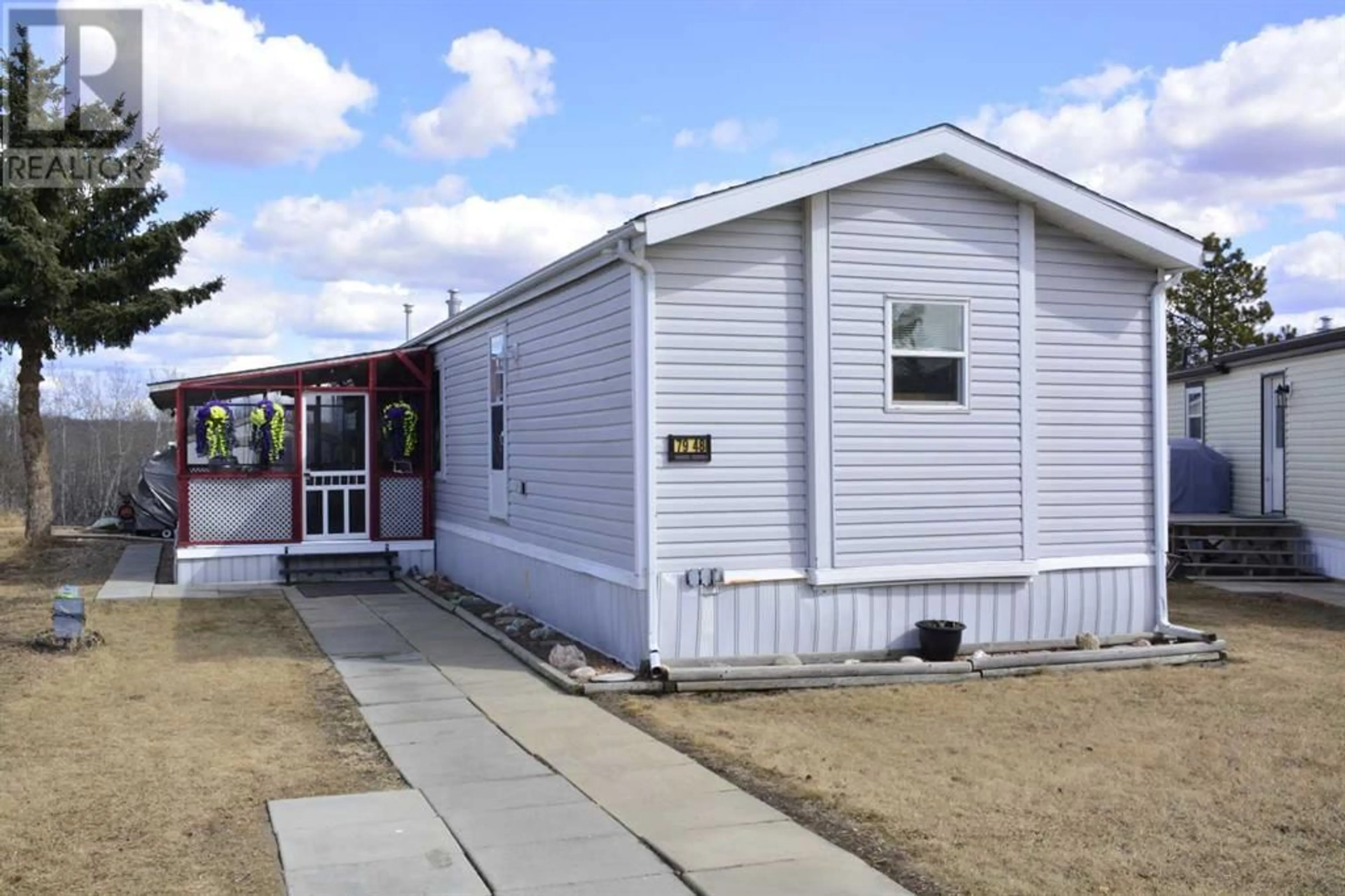 Home with vinyl exterior material for 7948 97 Avenue, Peace River Alberta T8S1H6