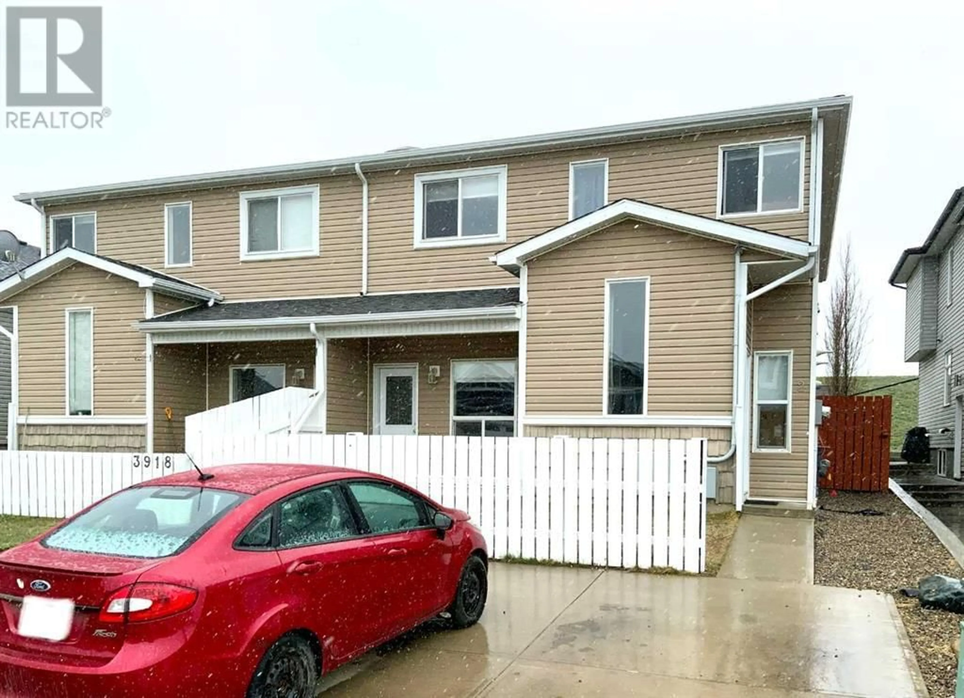 A pic from exterior of the house or condo for 2 3918 Sundance Road S, Coalhurst Alberta T0L0V0