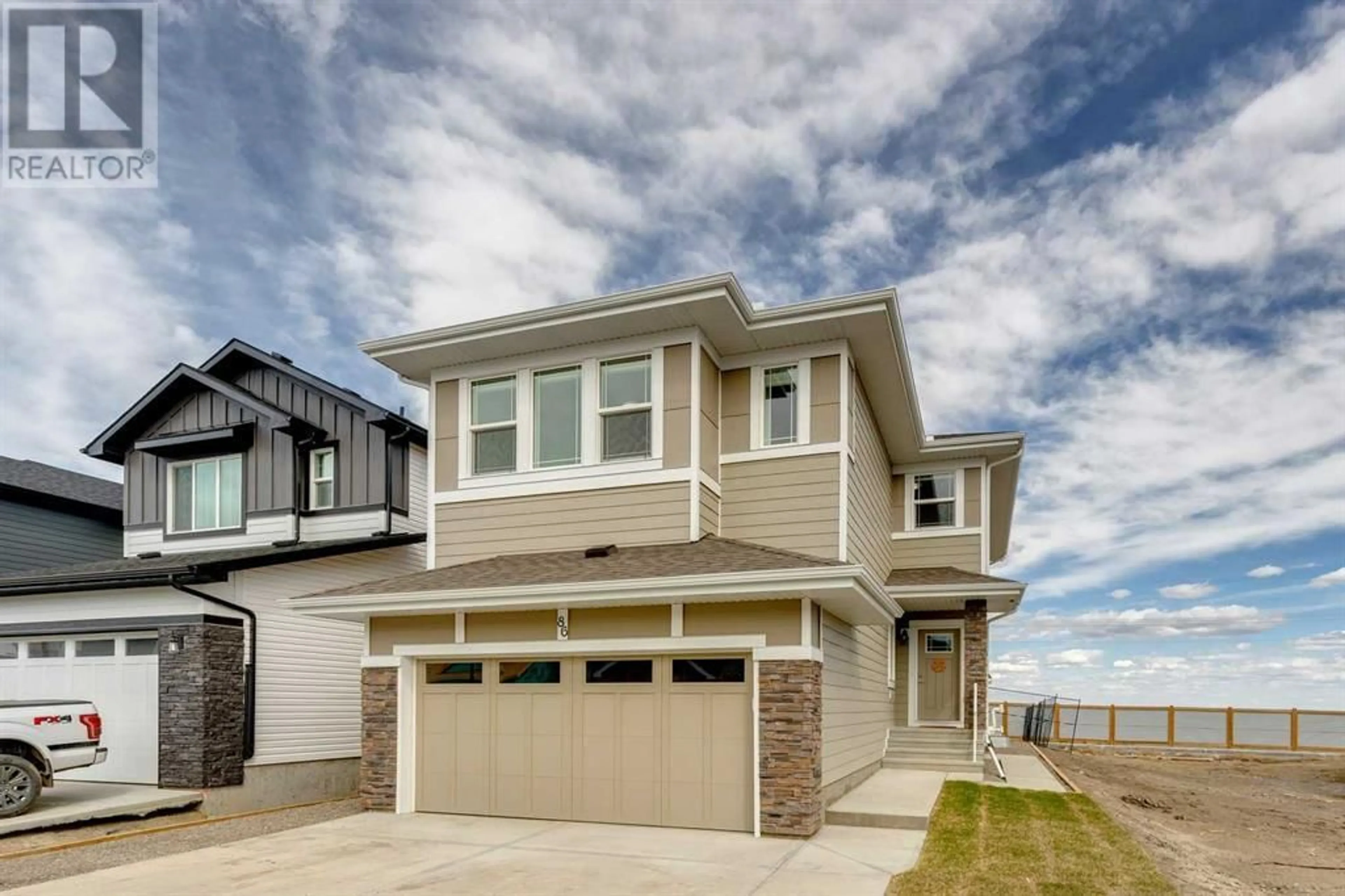 A pic from exterior of the house or condo for 86 Ranchers View, Okotoks Alberta T1S5R7
