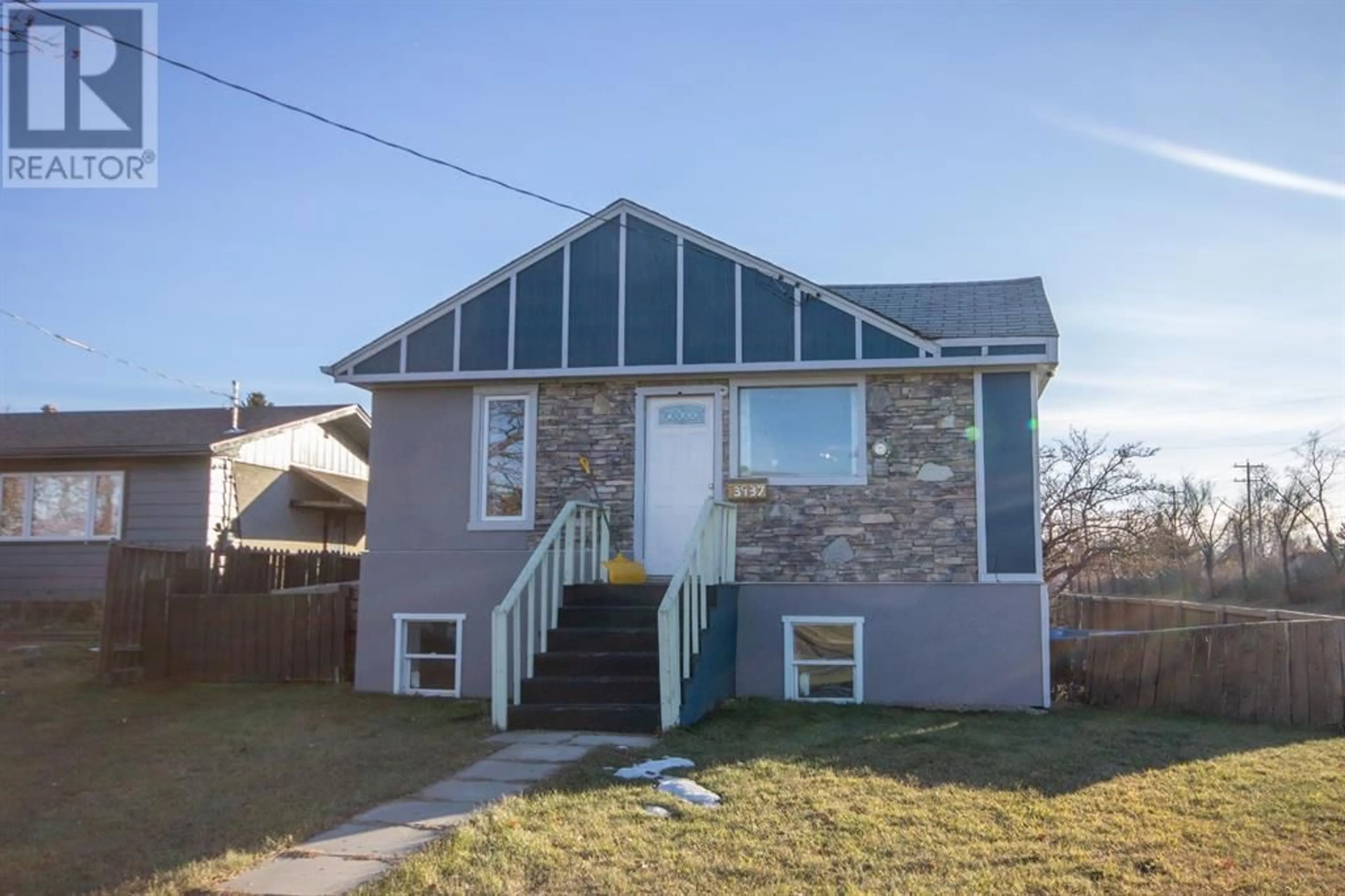 Frontside or backside of a home for 3937 46 Street, Red Deer Alberta T4N1L9