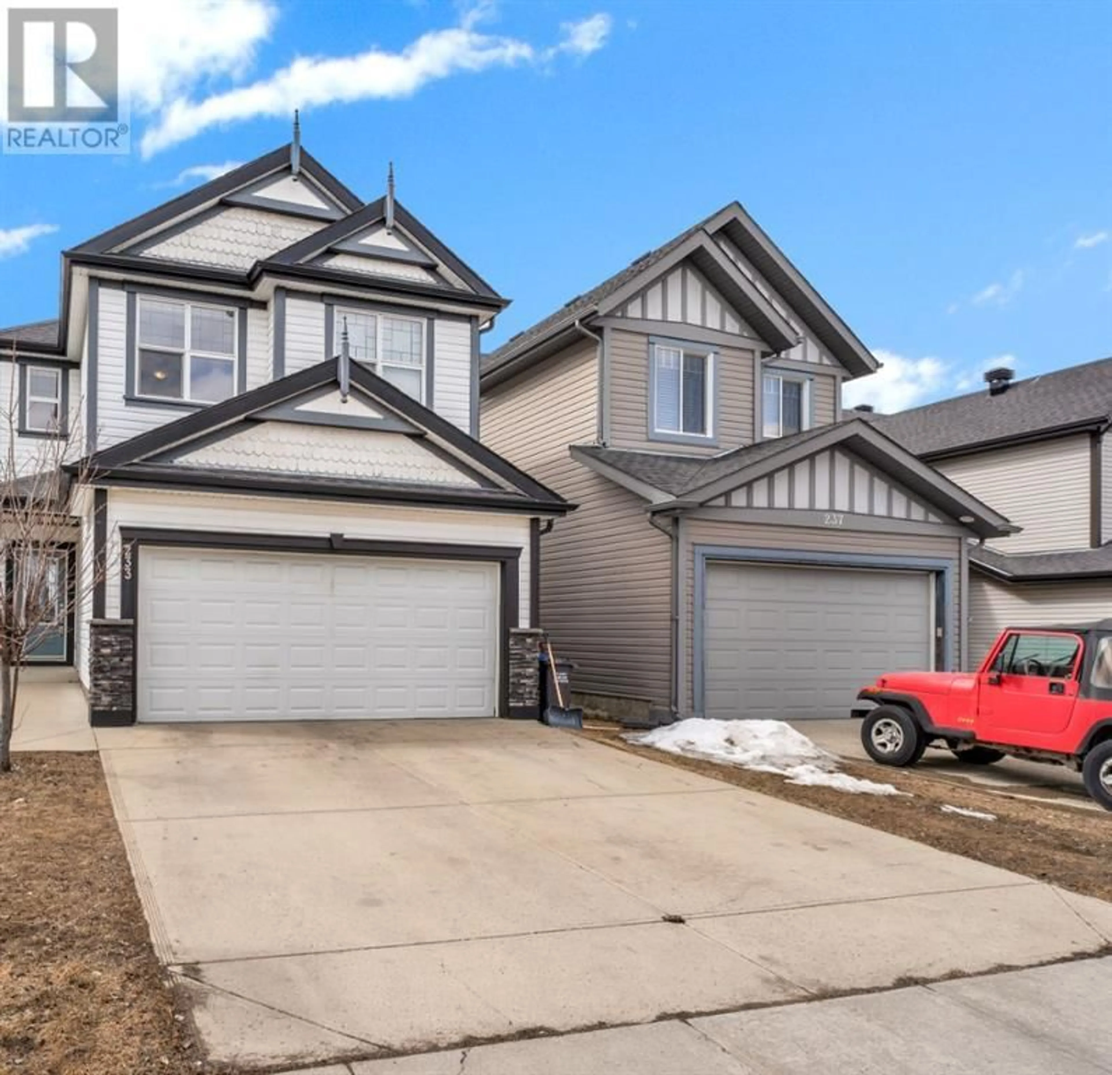 Frontside or backside of a home for 233 Sunset Heights, Cochrane Alberta T4C0E1