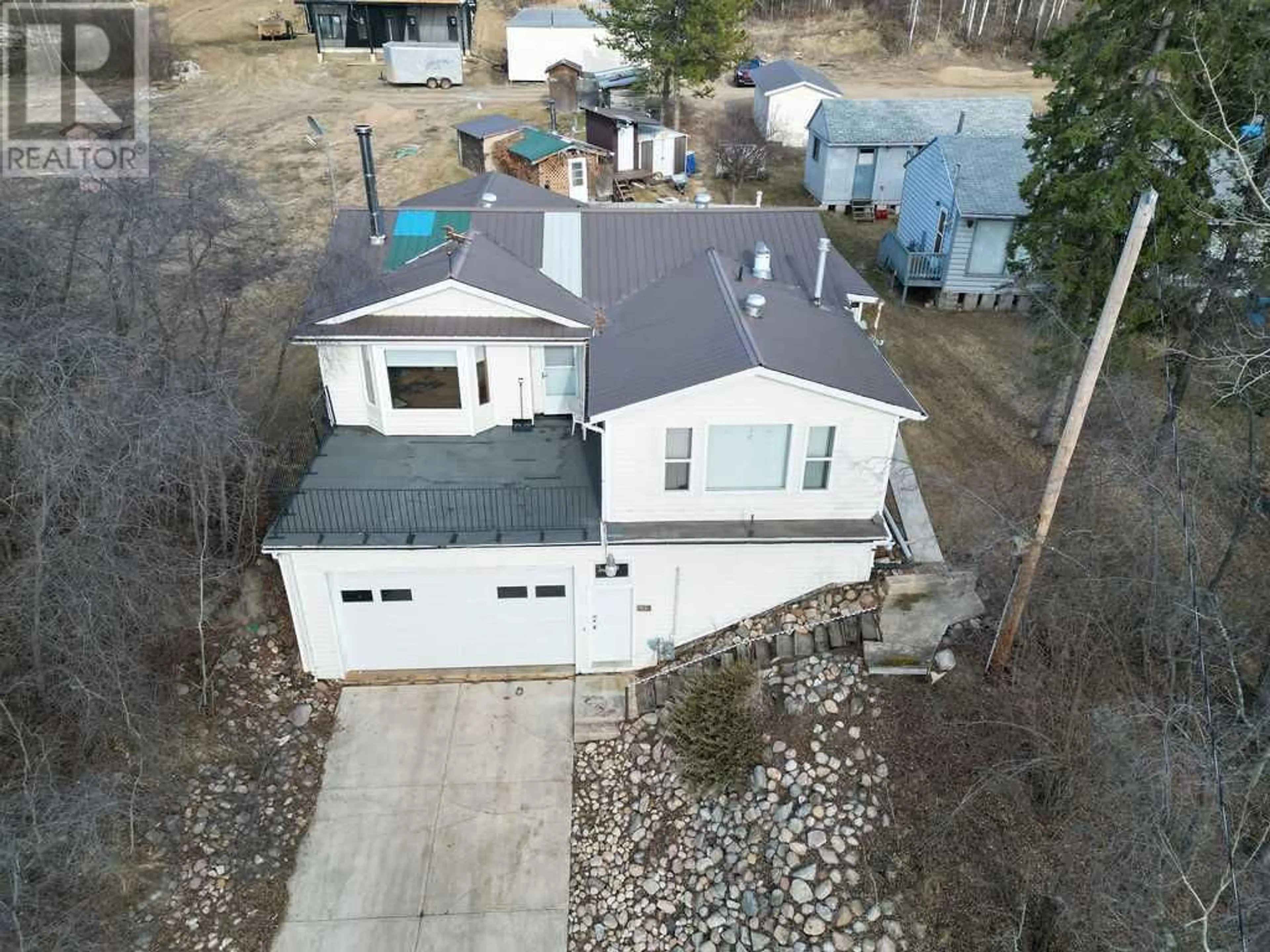Frontside or backside of a home for 618 Willow Drive, Sunset Beach Alberta T9S1R6