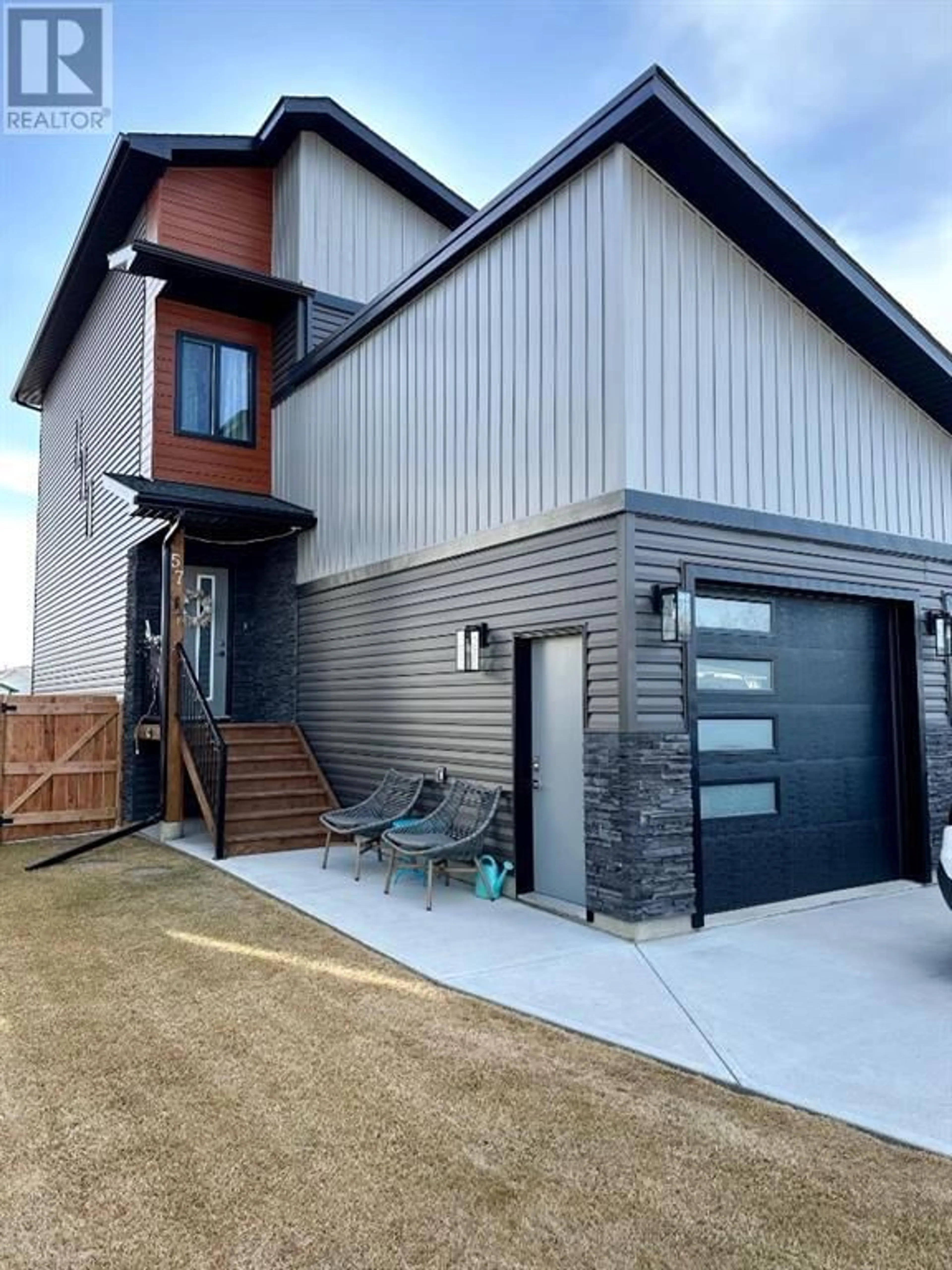 Frontside or backside of a home for 57 Pritchard Drive, Whitecourt Alberta T7S0G3