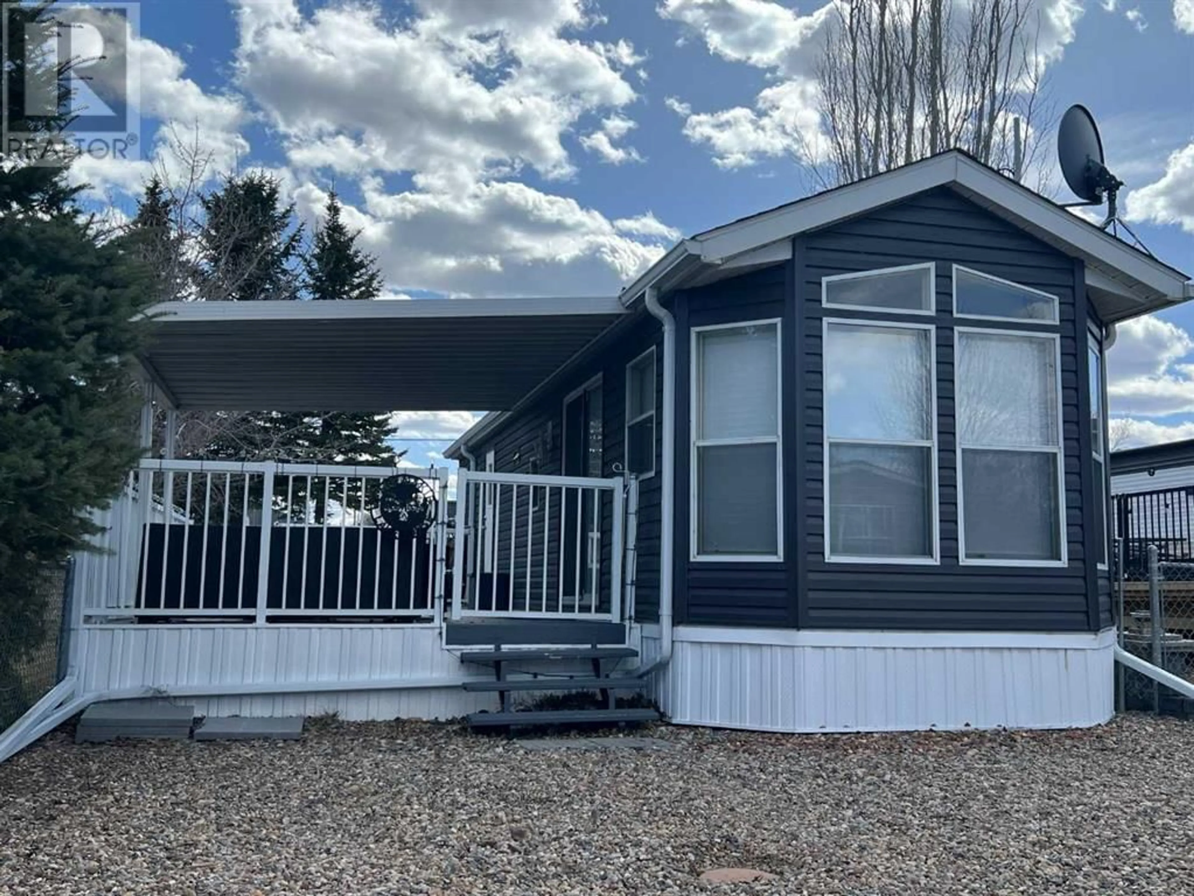 Home with vinyl exterior material for 150 Cormorant Crescent, Rural Vulcan County Alberta T0L2B0