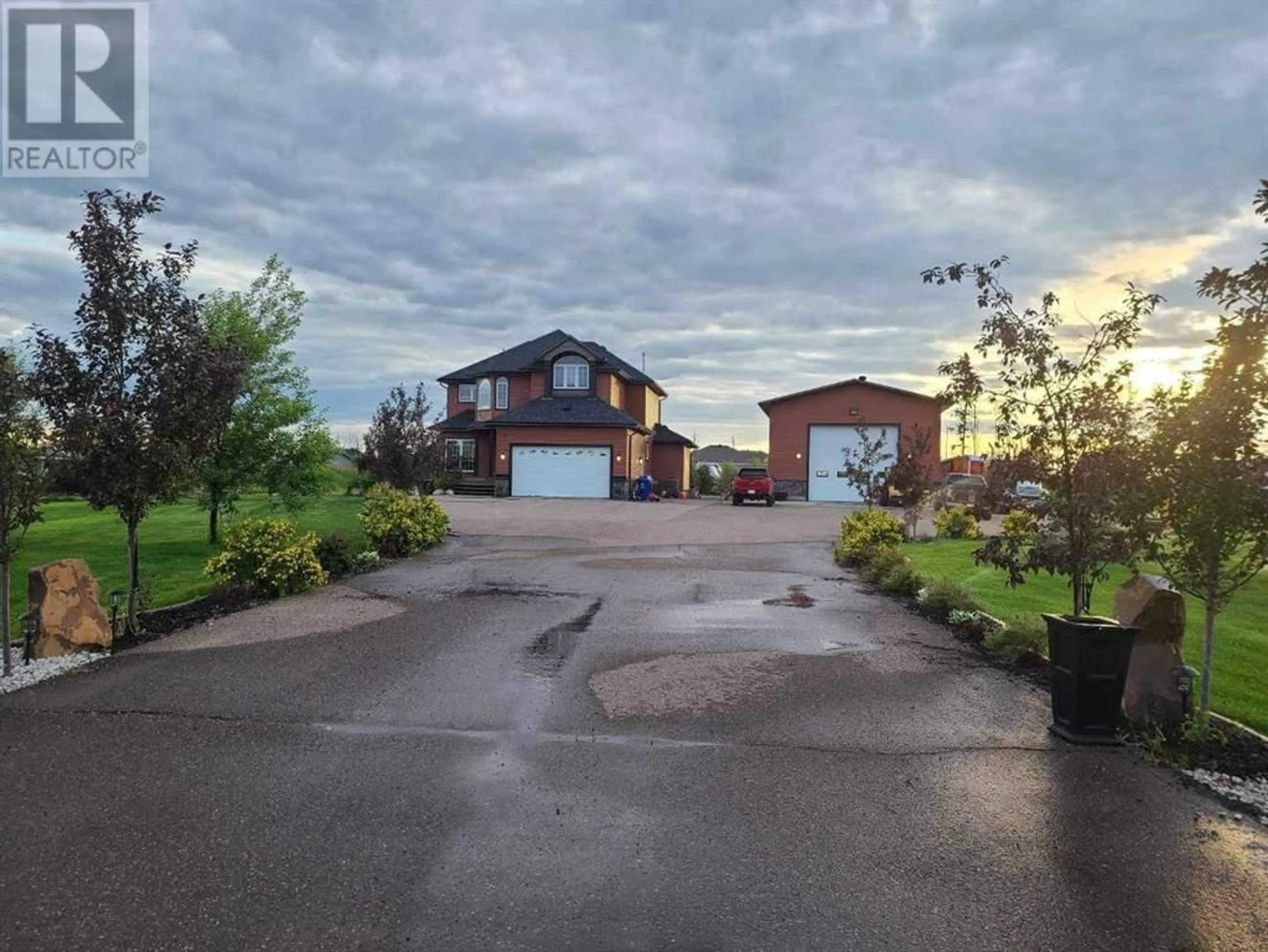 Frontside or backside of a home for 104 Spruce Valley Gate, Saprae Creek Alberta T9H5B4