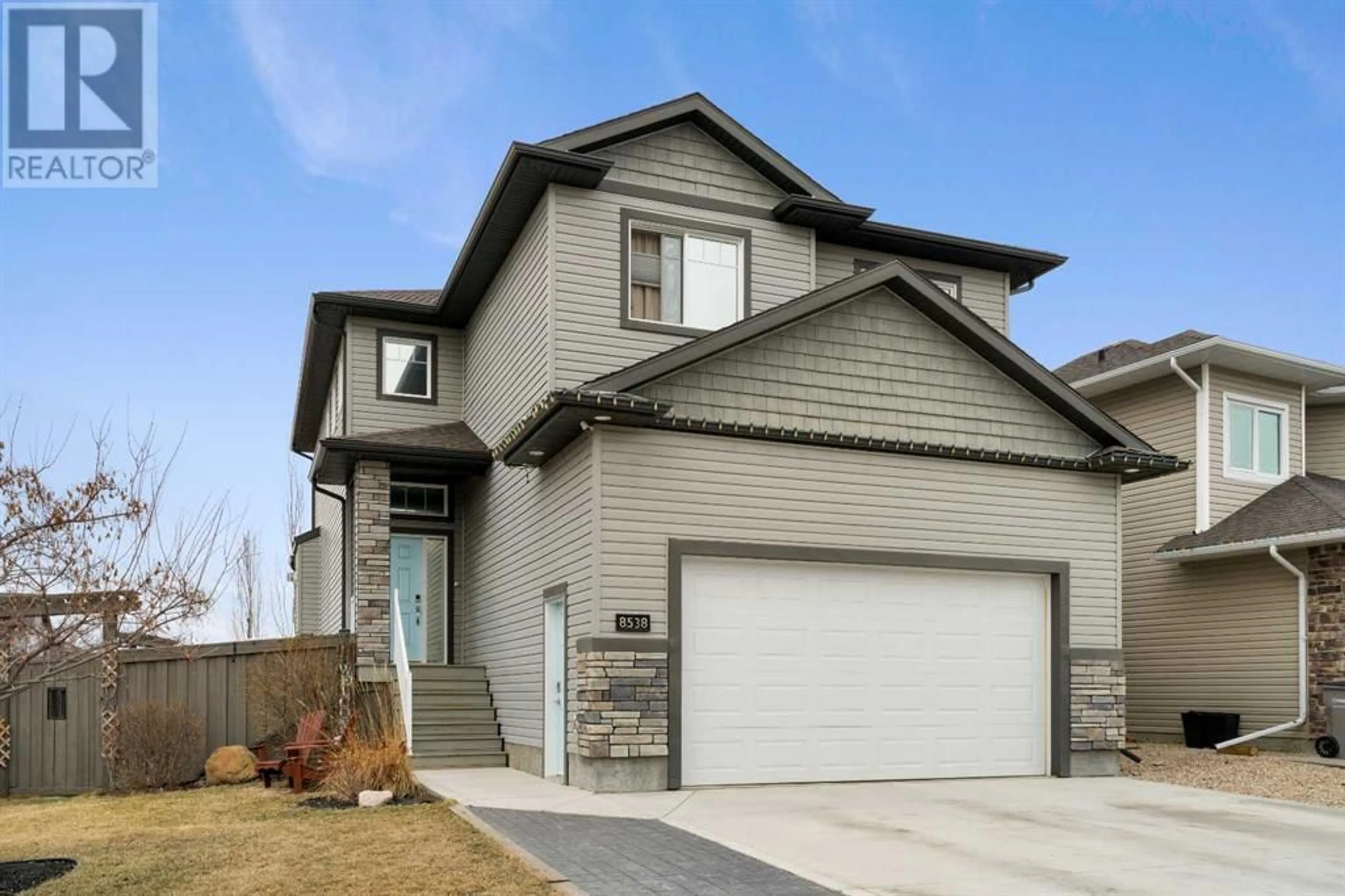Frontside or backside of a home for 8538 70A Avenue, Grande Prairie Alberta T8X0M4