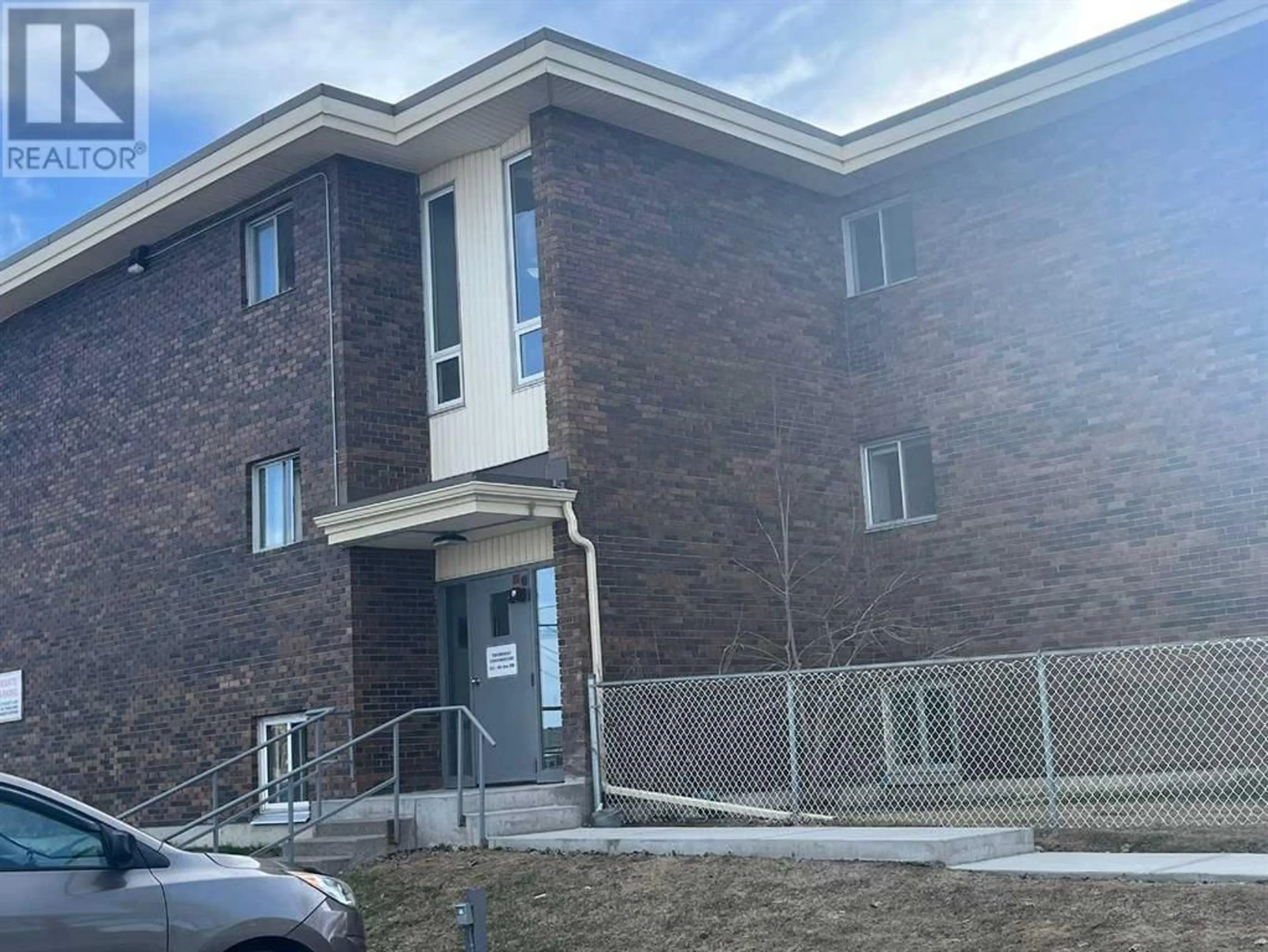 A pic from exterior of the house or condo for 205 231 64 Avenue NW, Calgary Alberta T2K0M1