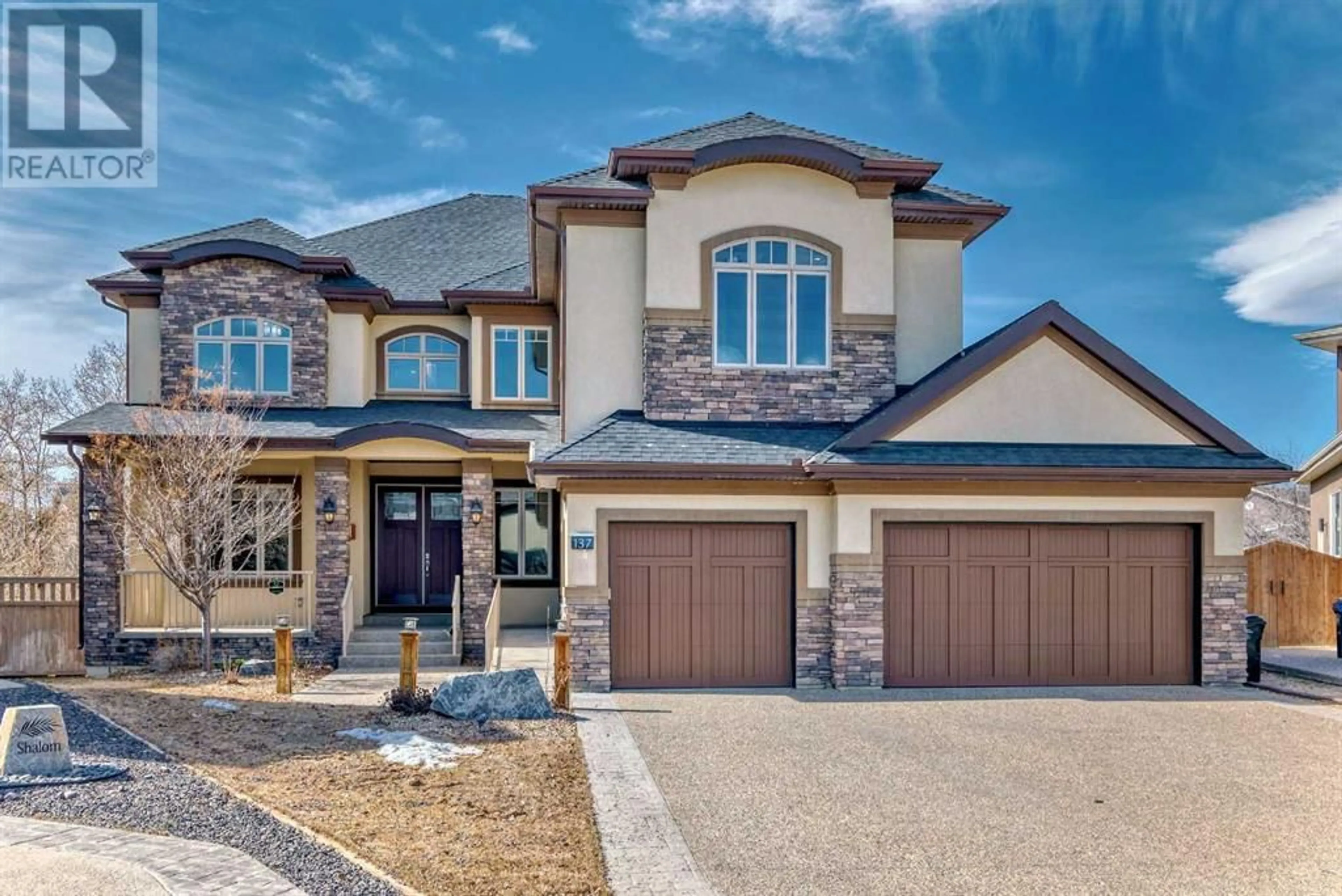 Home with brick exterior material for 137 Aspen Summit Heath SW, Calgary Alberta T3H0T5