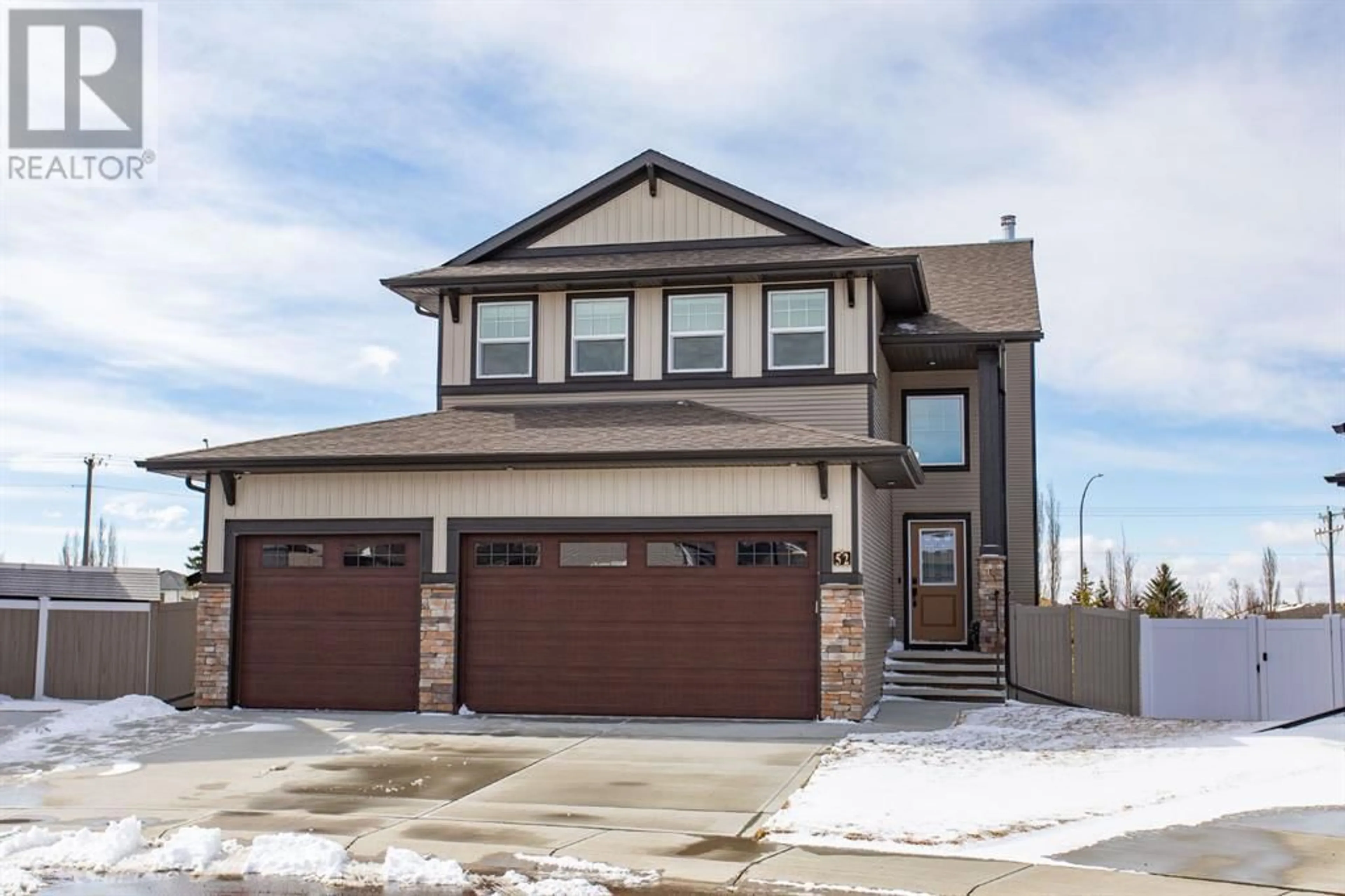 Frontside or backside of a home for 52 Toal Close, Red Deer Alberta T4P0W6
