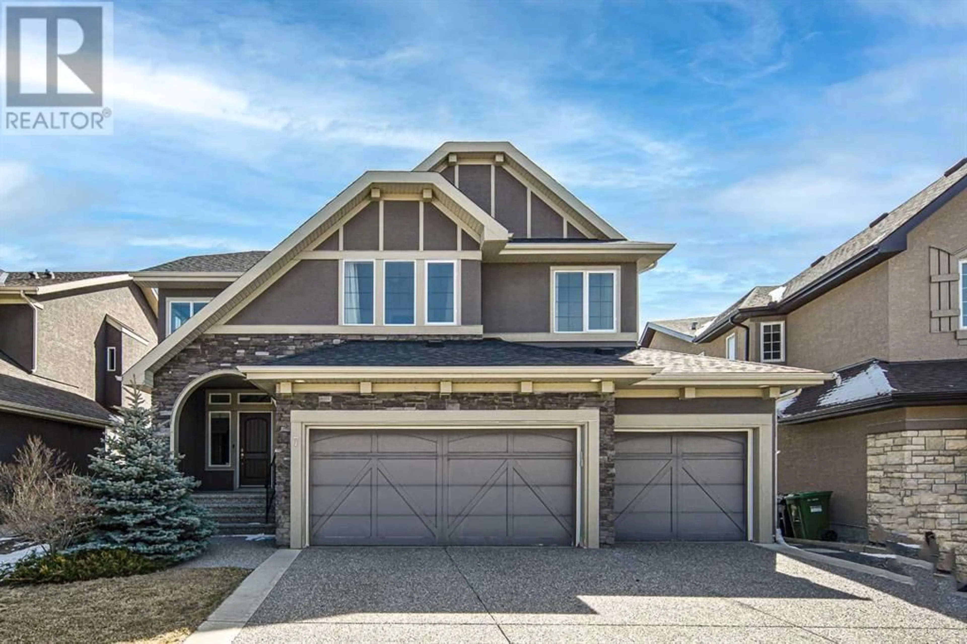 Frontside or backside of a home for 7 Springbluff Point SW, Calgary Alberta T3H0N2