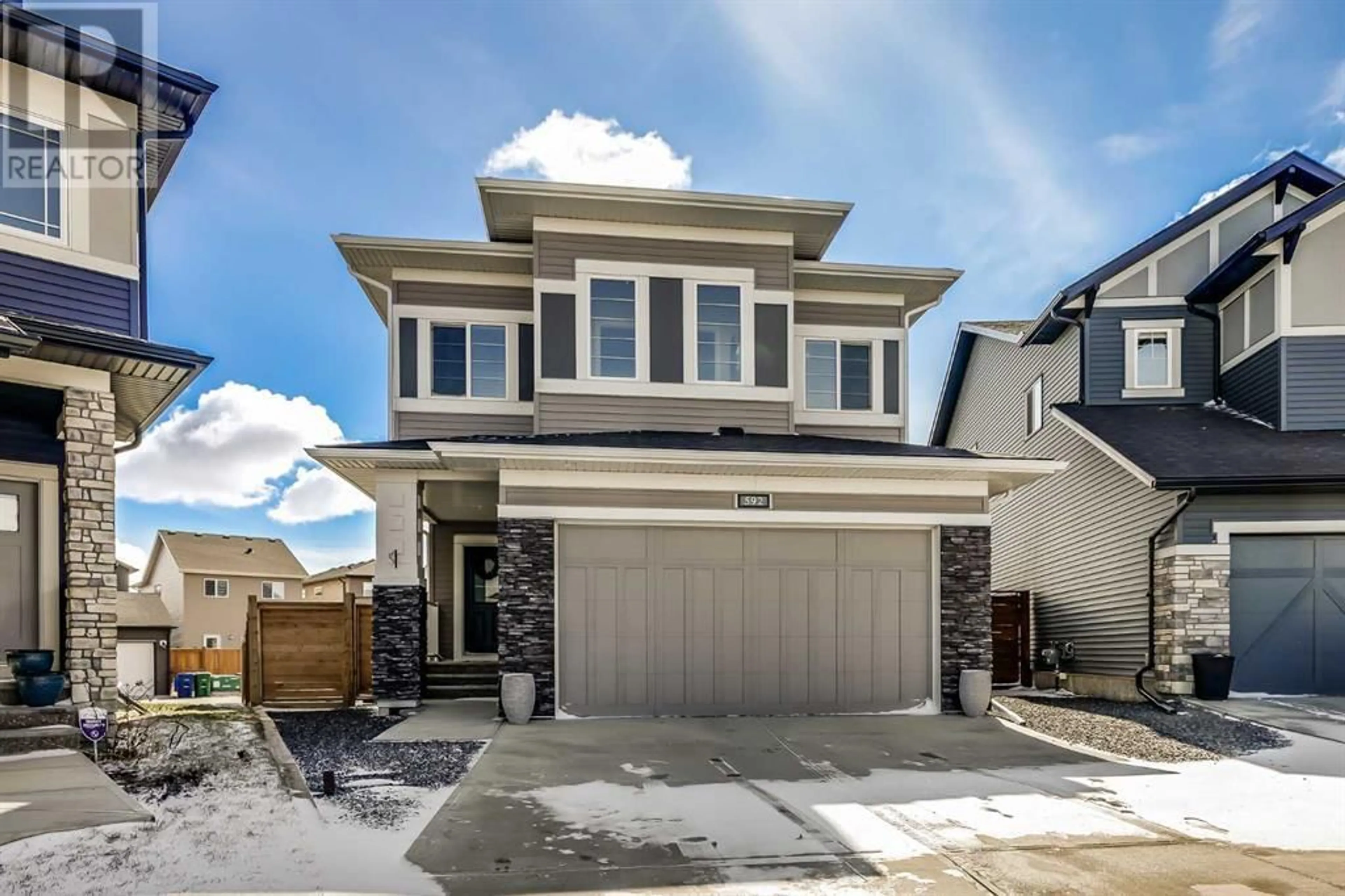 Frontside or backside of a home for 592 Chinook Gate Square SW, Airdrie Alberta T4B5E2