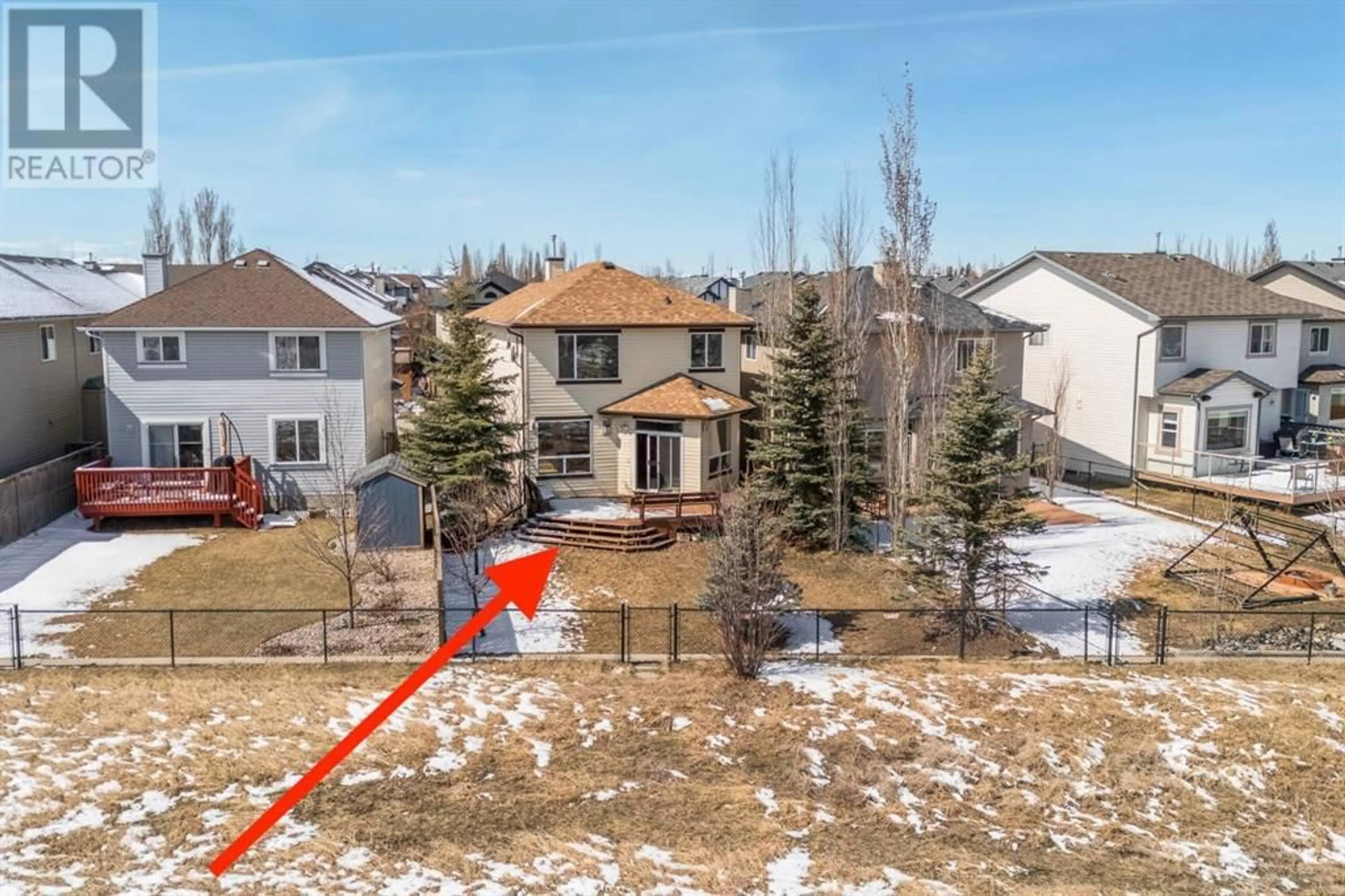 Frontside or backside of a home for 202 Tuscany Ravine Close NW, Calgary Alberta T3L2X4