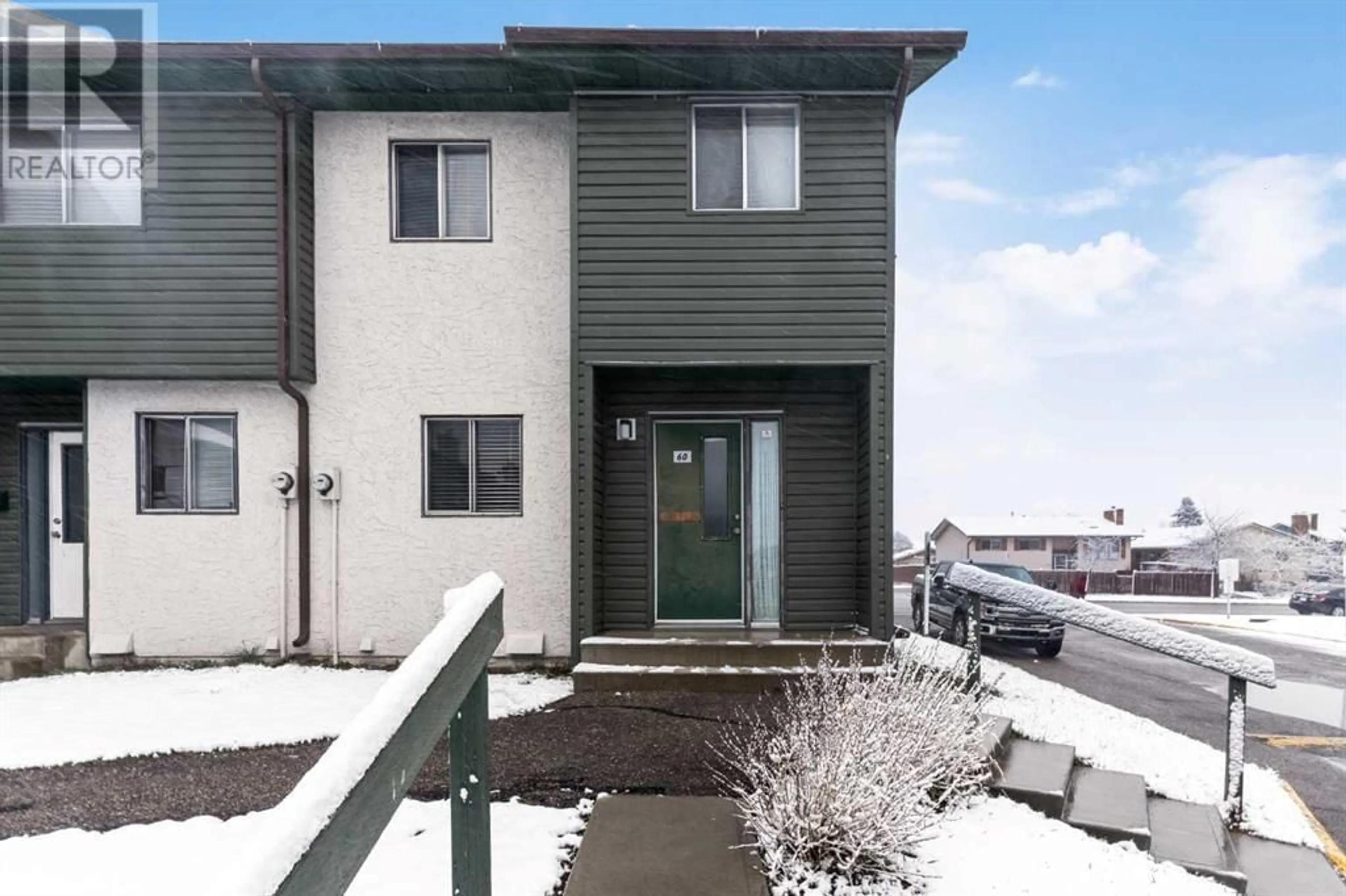A pic from exterior of the house or condo for 60 2511 38 Street NE, Calgary Alberta T1Y4M7