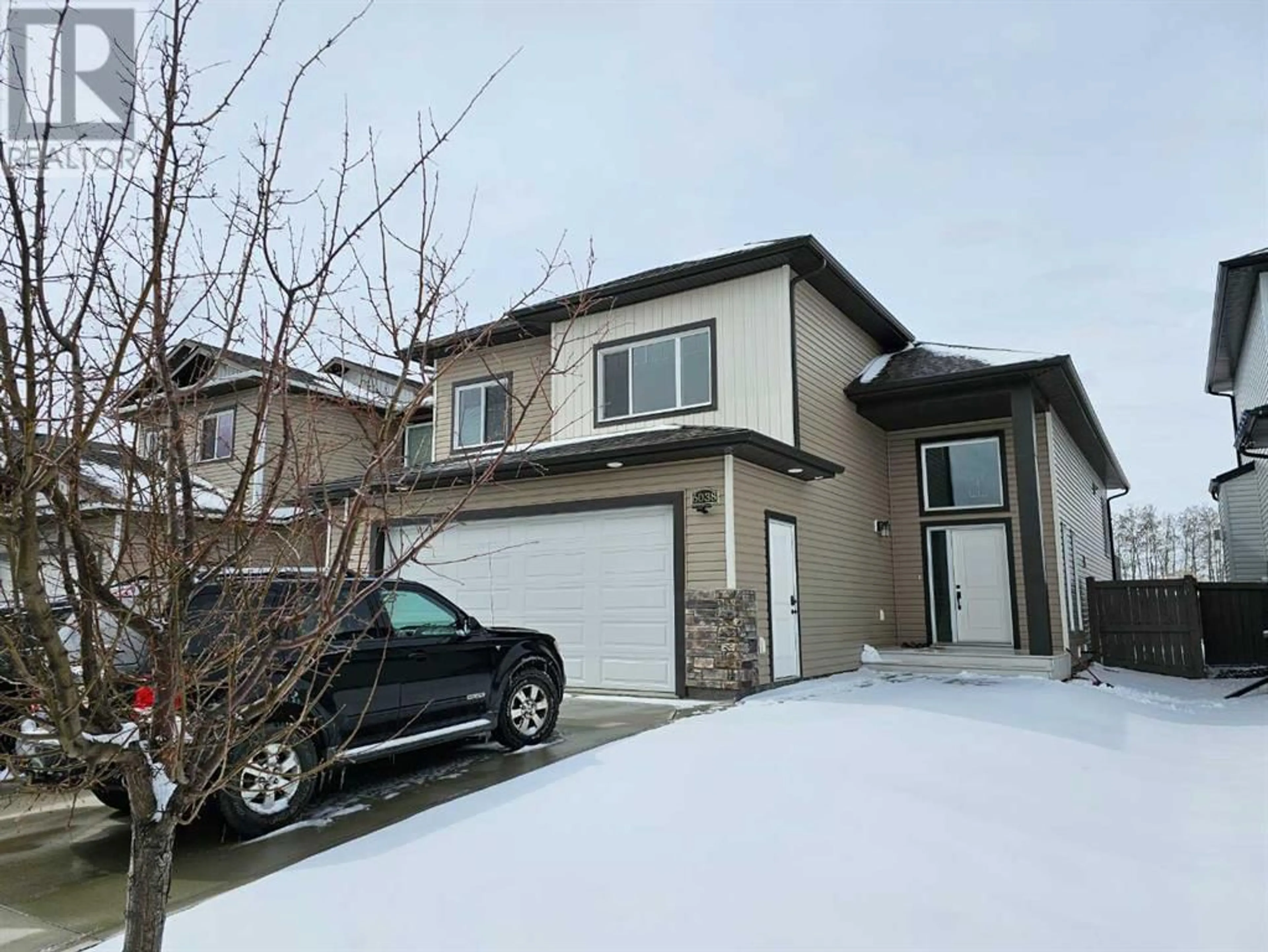 Frontside or backside of a home for 6038 114A Street, Grande Prairie Alberta T8W3Y7