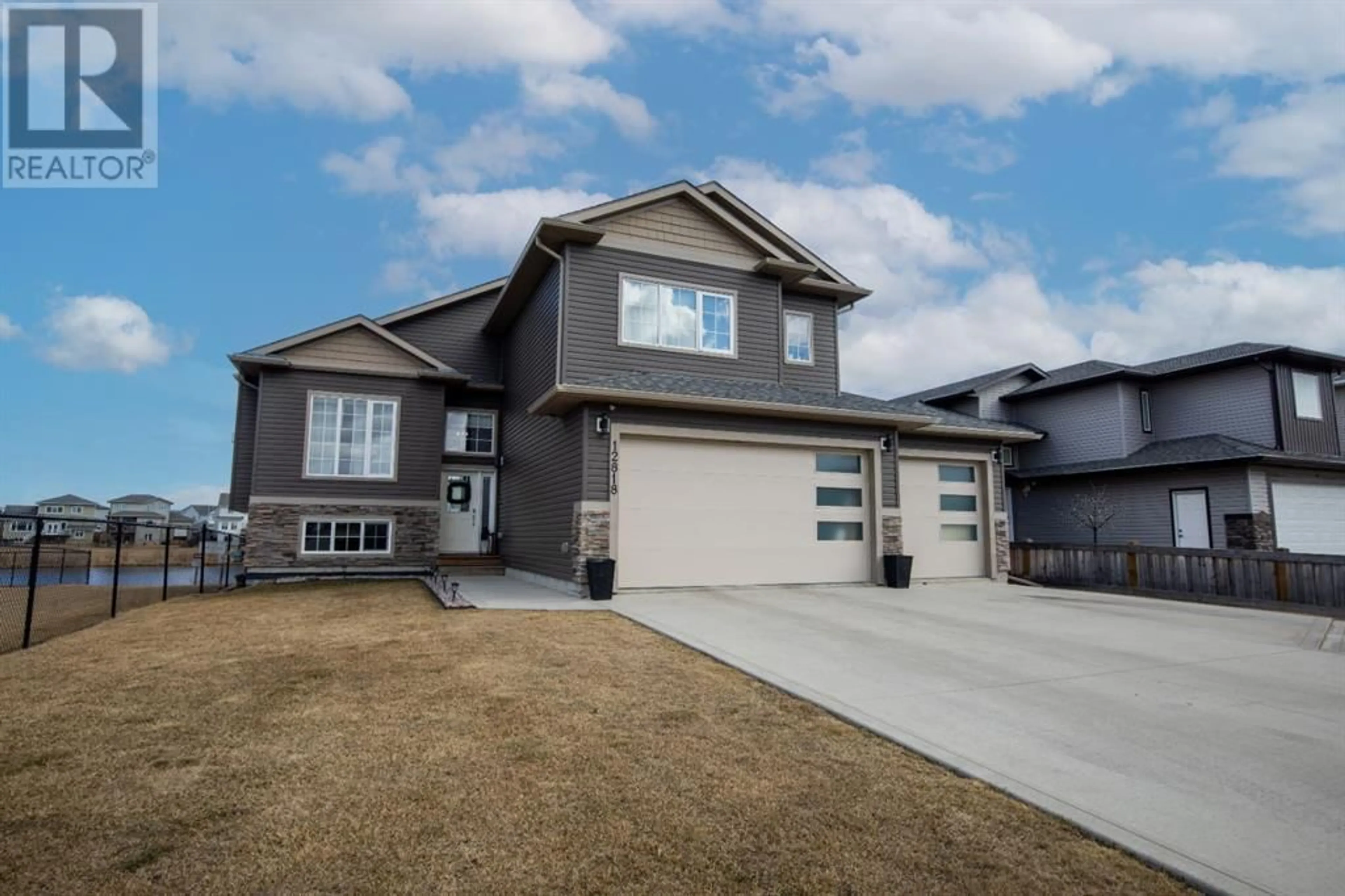 Frontside or backside of a home for 12818 Oak Road, Grande Prairie Alberta T8V4J9