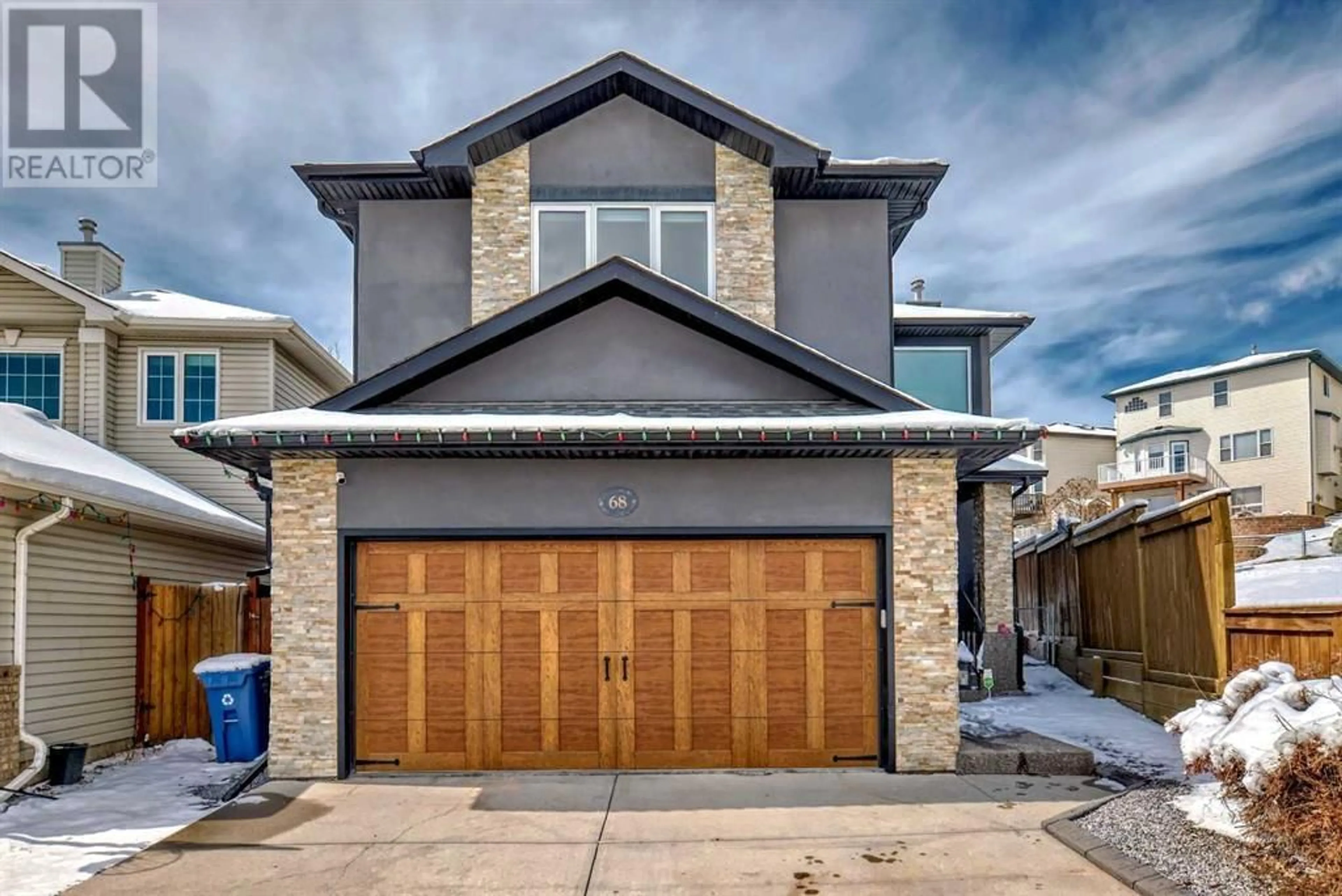 Home with brick exterior material for 68 Arbour Crest Court NW, Calgary Alberta T3G4T5