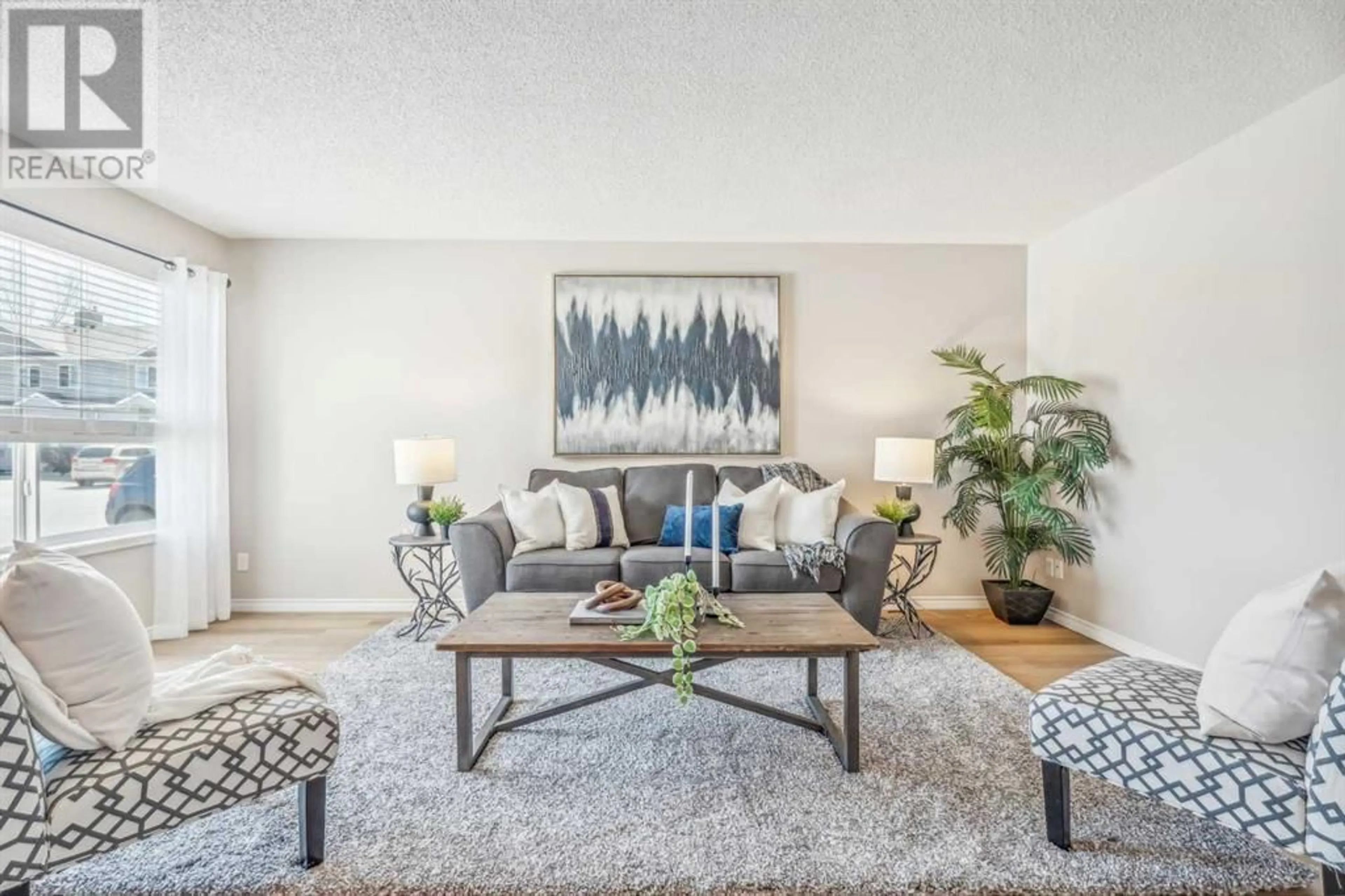 Living room for 2 900 Allen Street SE, Airdrie Alberta T4B2M2