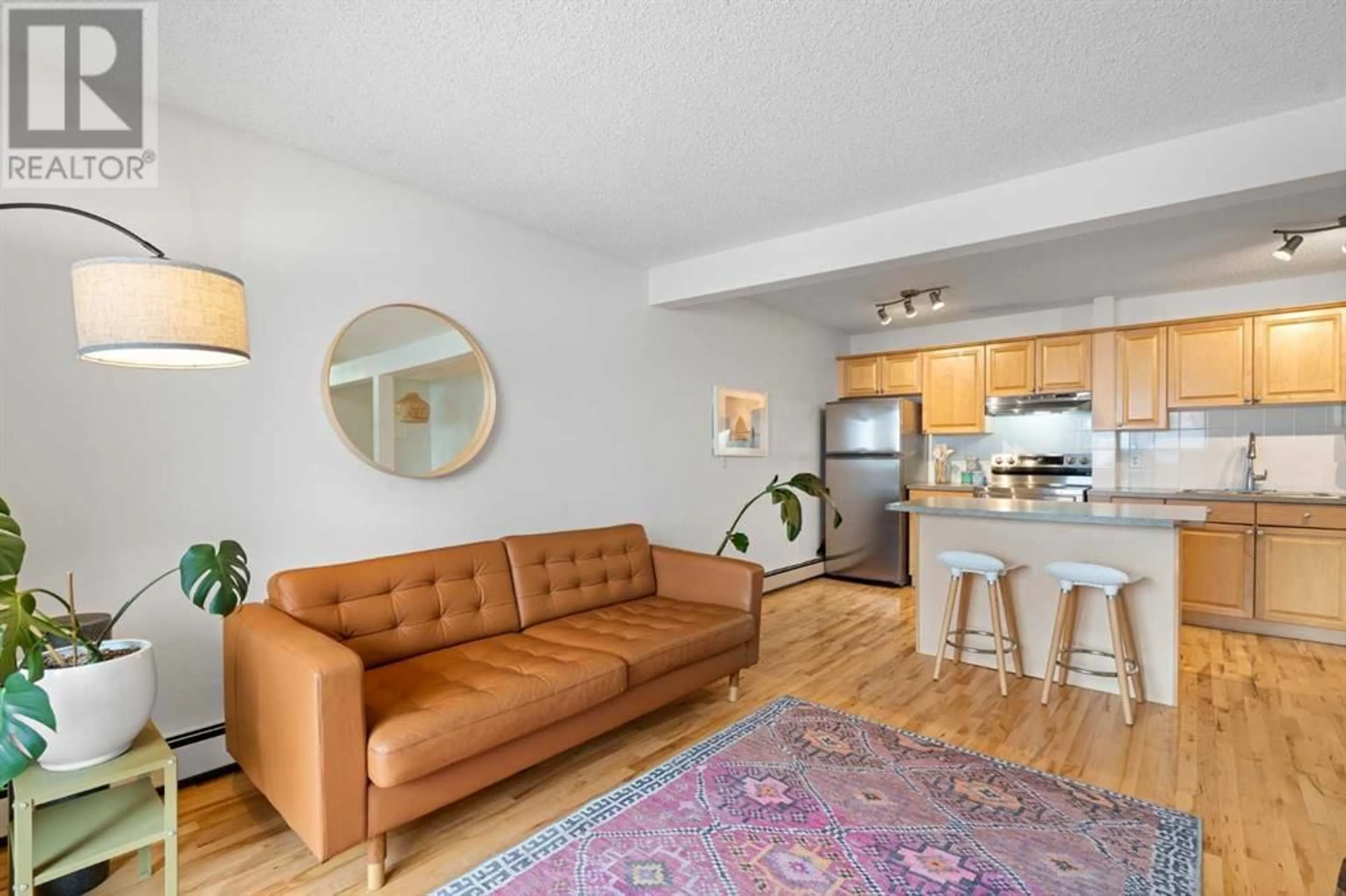 Living room for 202 222 5 Avenue NE, Calgary Alberta T2E0K6