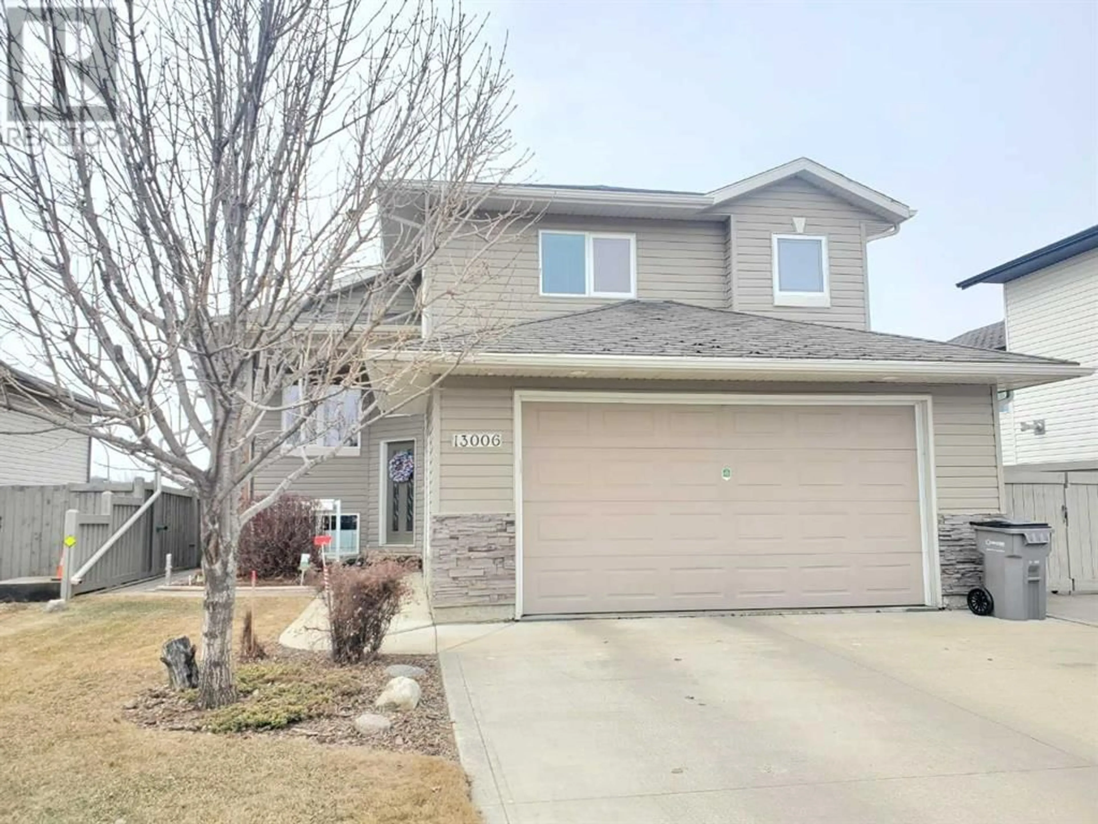 Frontside or backside of a home for 13006 88A Street, Grande Prairie Alberta T8X1V8