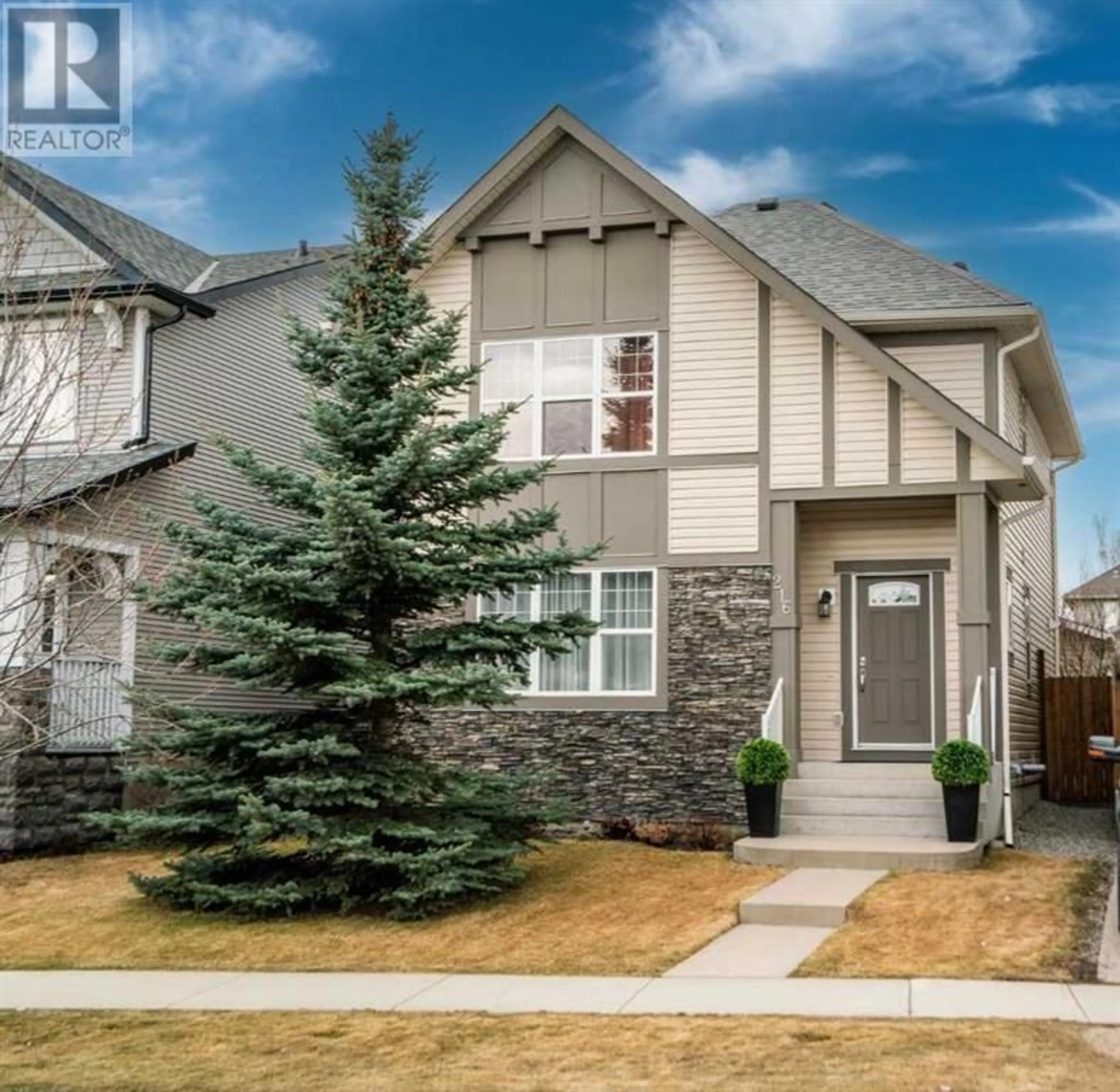 Frontside or backside of a home for 216 Silverado Drive SW, Calgary Alberta T2X0G1