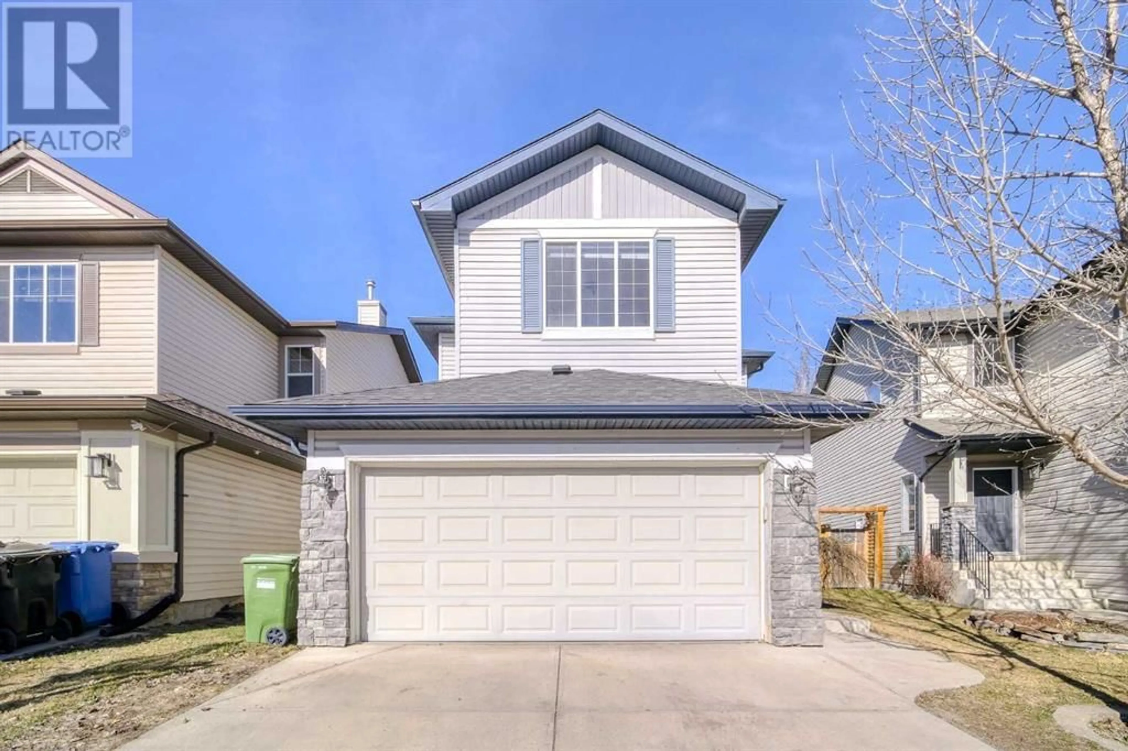 Frontside or backside of a home for 148 Chapman Close SE, Calgary Alberta T2X3V7