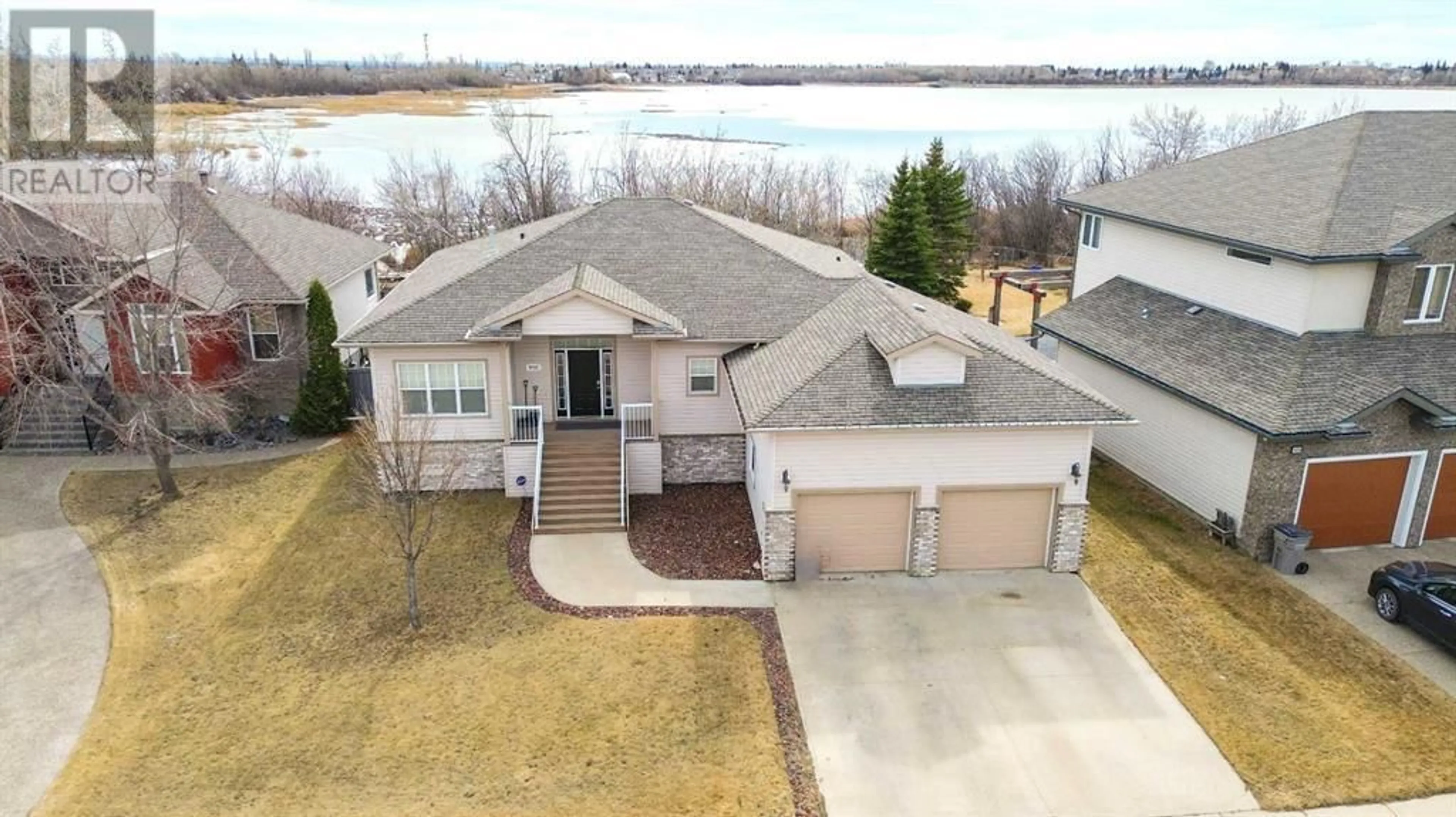 Frontside or backside of a home for 9005 Lakeshore Drive, Grande Prairie Alberta T8X8C7