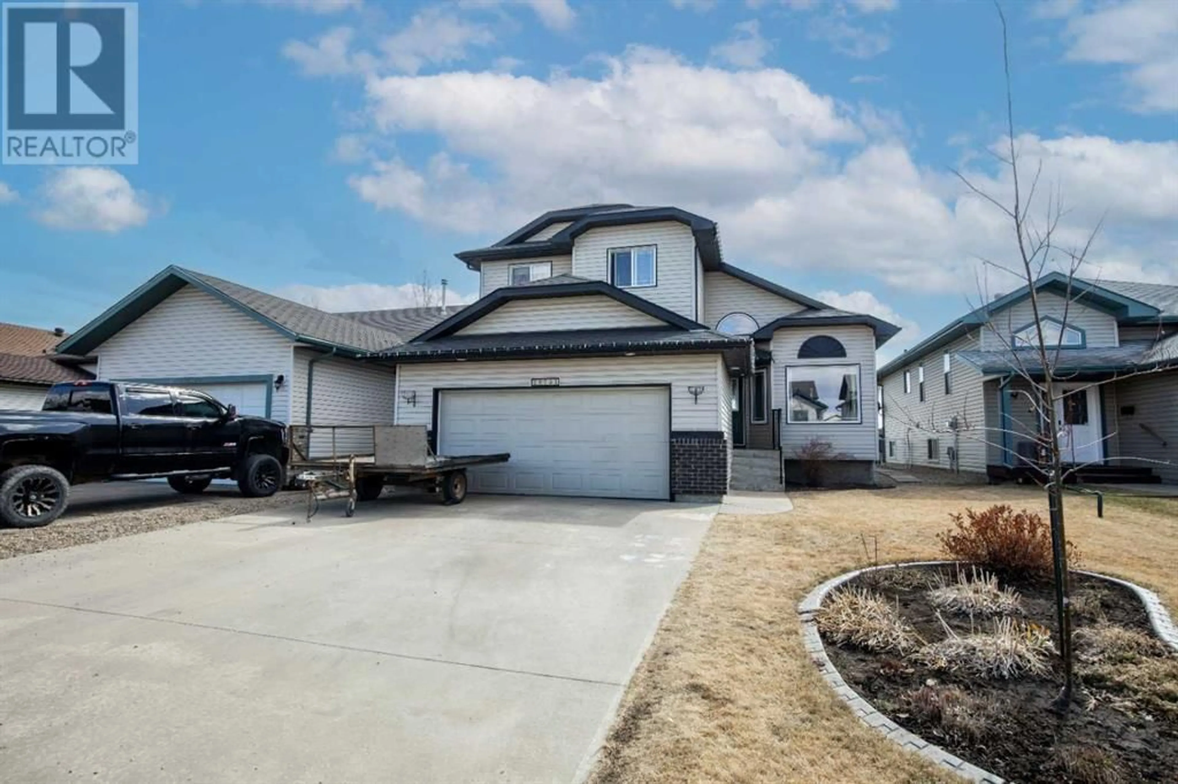 Frontside or backside of a home for 10741 72 Avenue, Grande Prairie Alberta T8W2T6