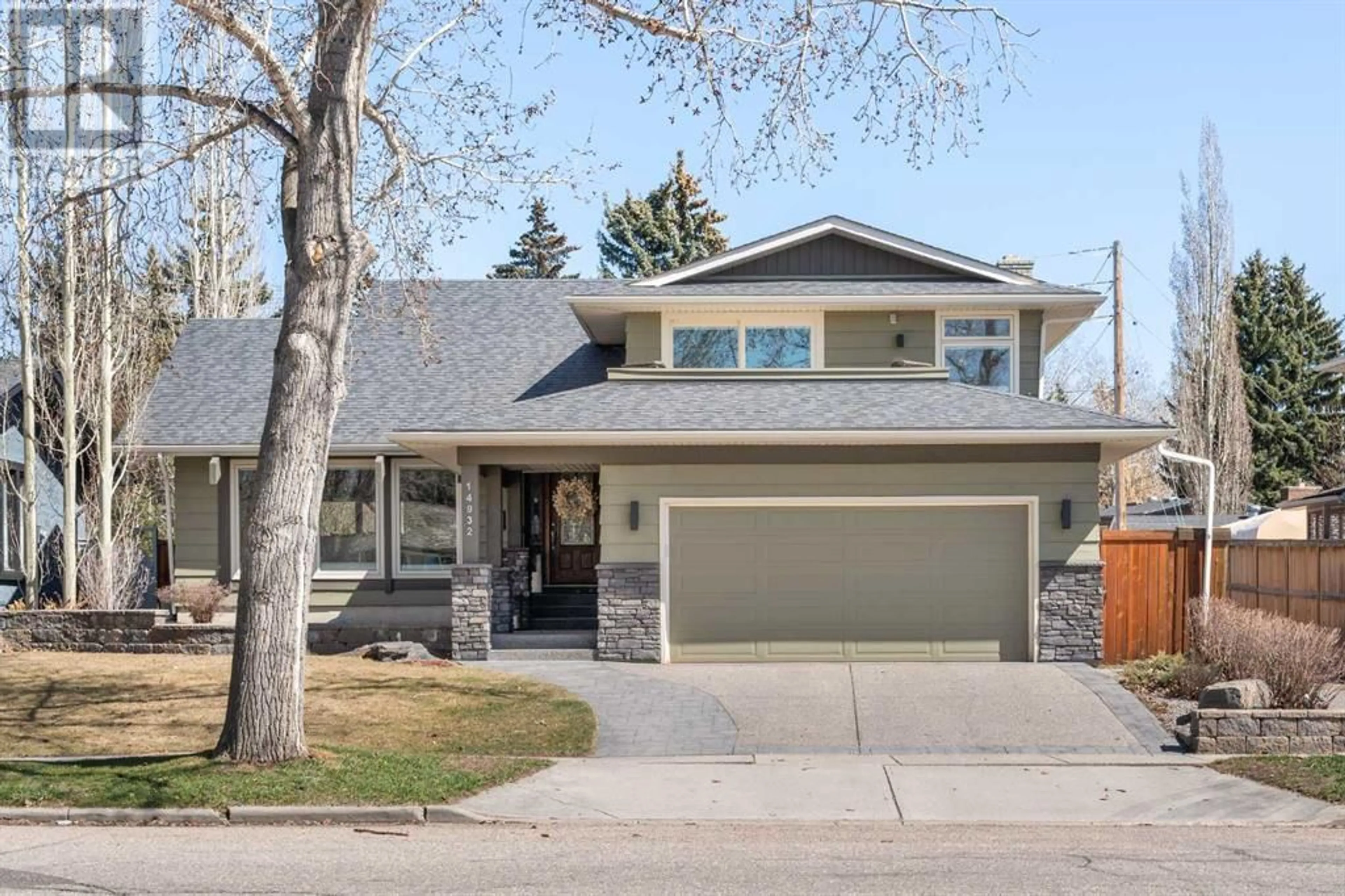 Frontside or backside of a home for 14932 Parkland Boulevard SE, Calgary Alberta T2J5E6
