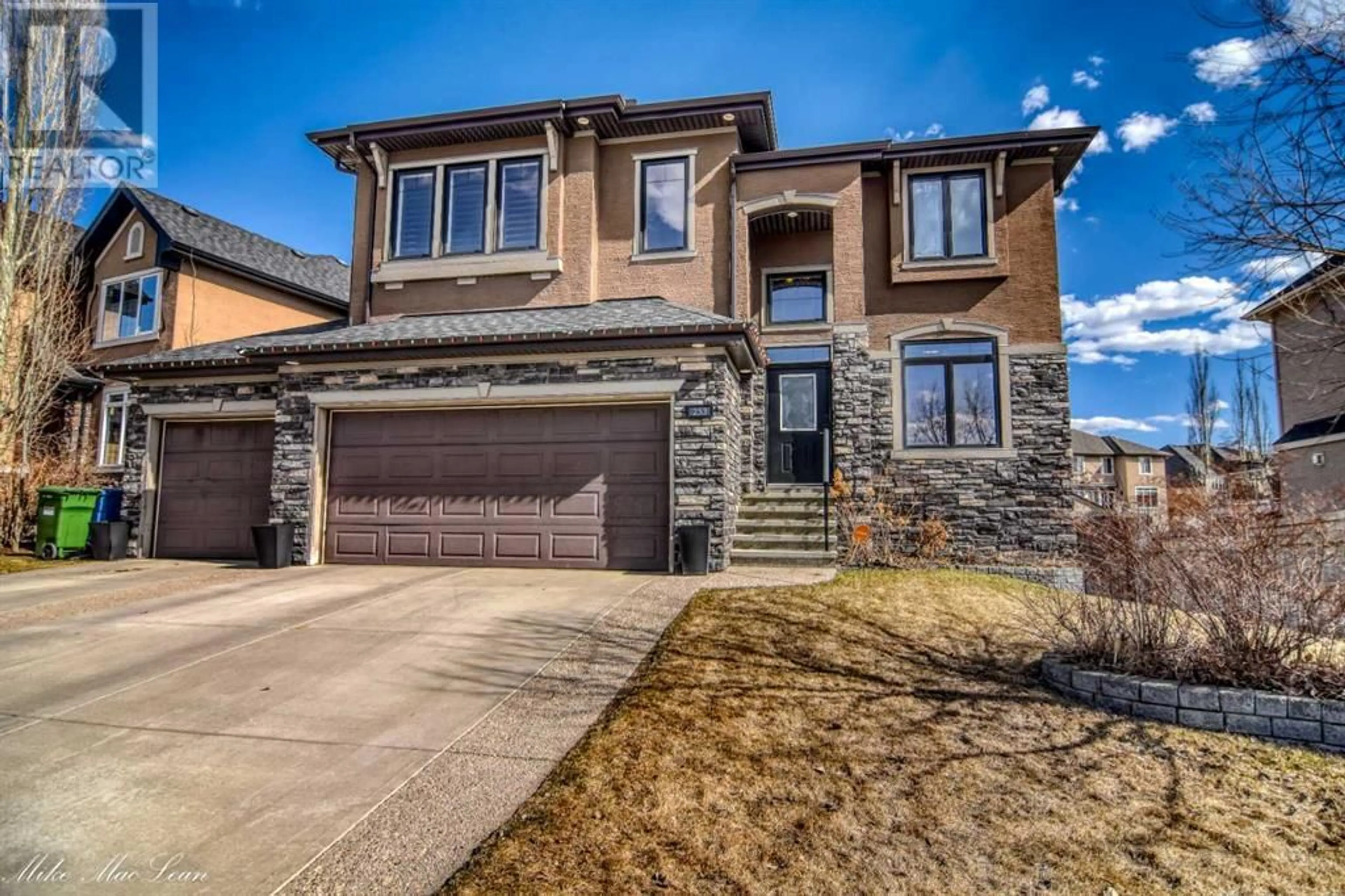 Frontside or backside of a home for 253 Tuscany Estates Rise NW, Calgary Alberta T3L0B3