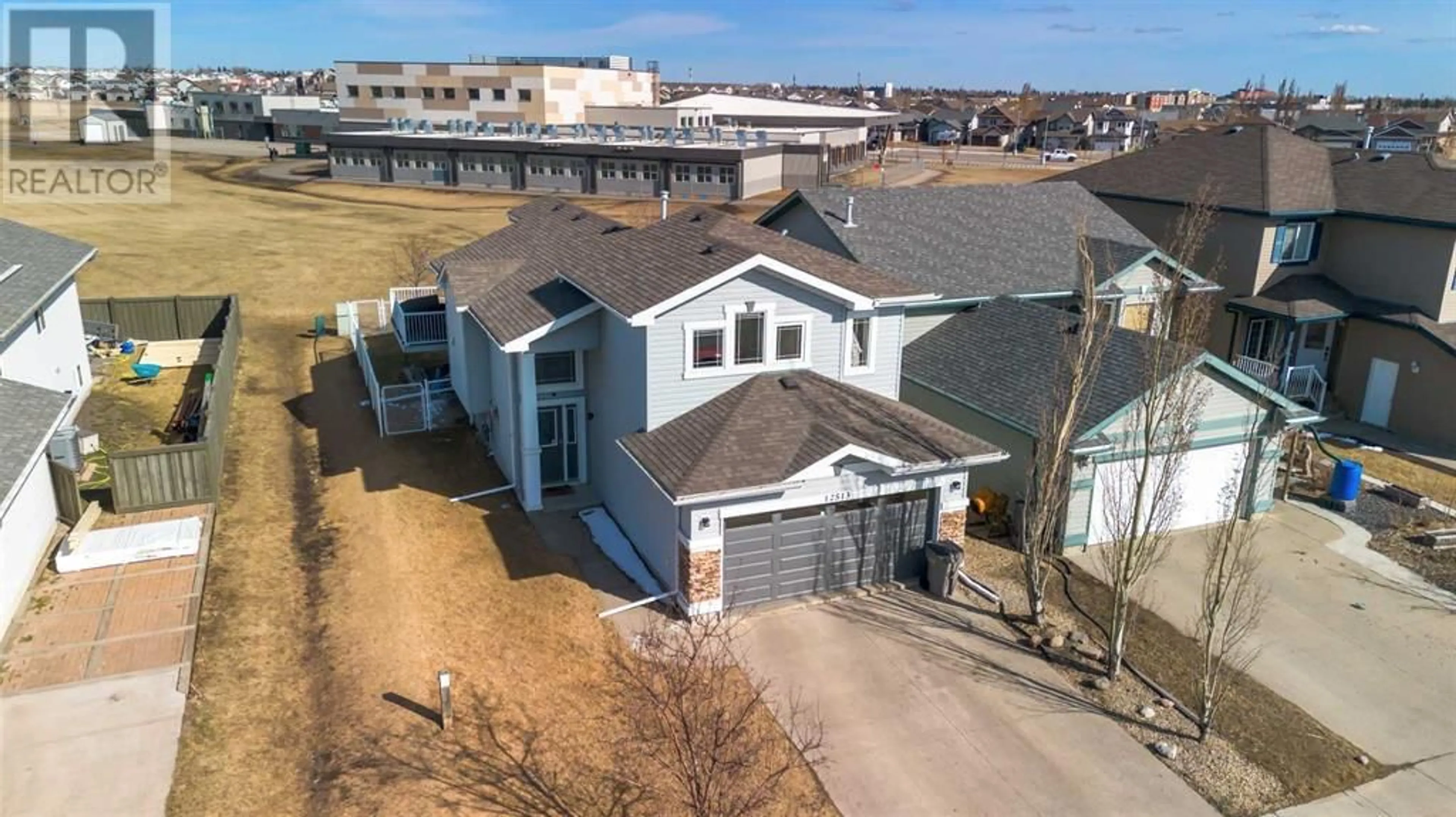 Frontside or backside of a home for 12513 105 Street, Grande Prairie Alberta T8V8L6