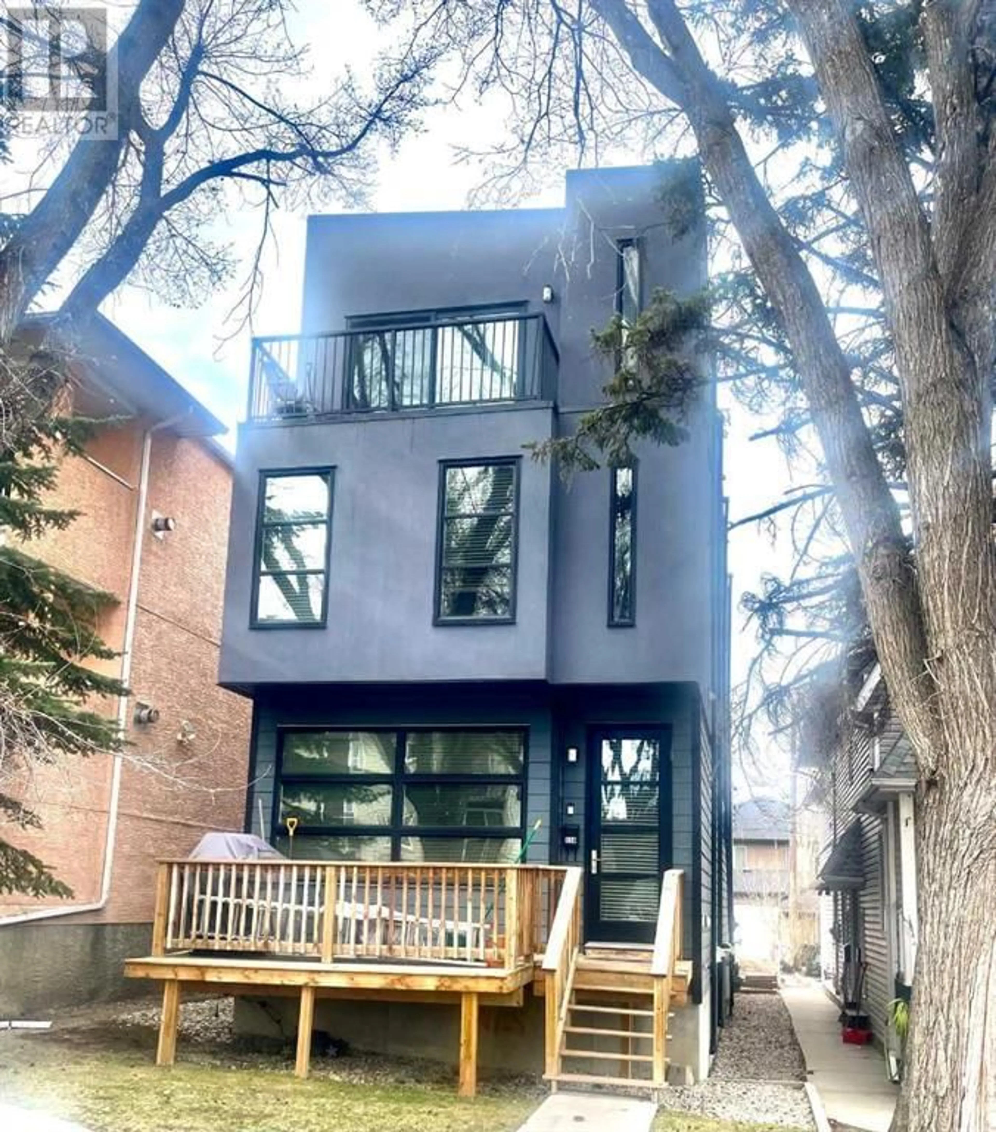 A pic from exterior of the house or condo for 1 114 28 Avenue NW, Calgary Alberta T2M2K2