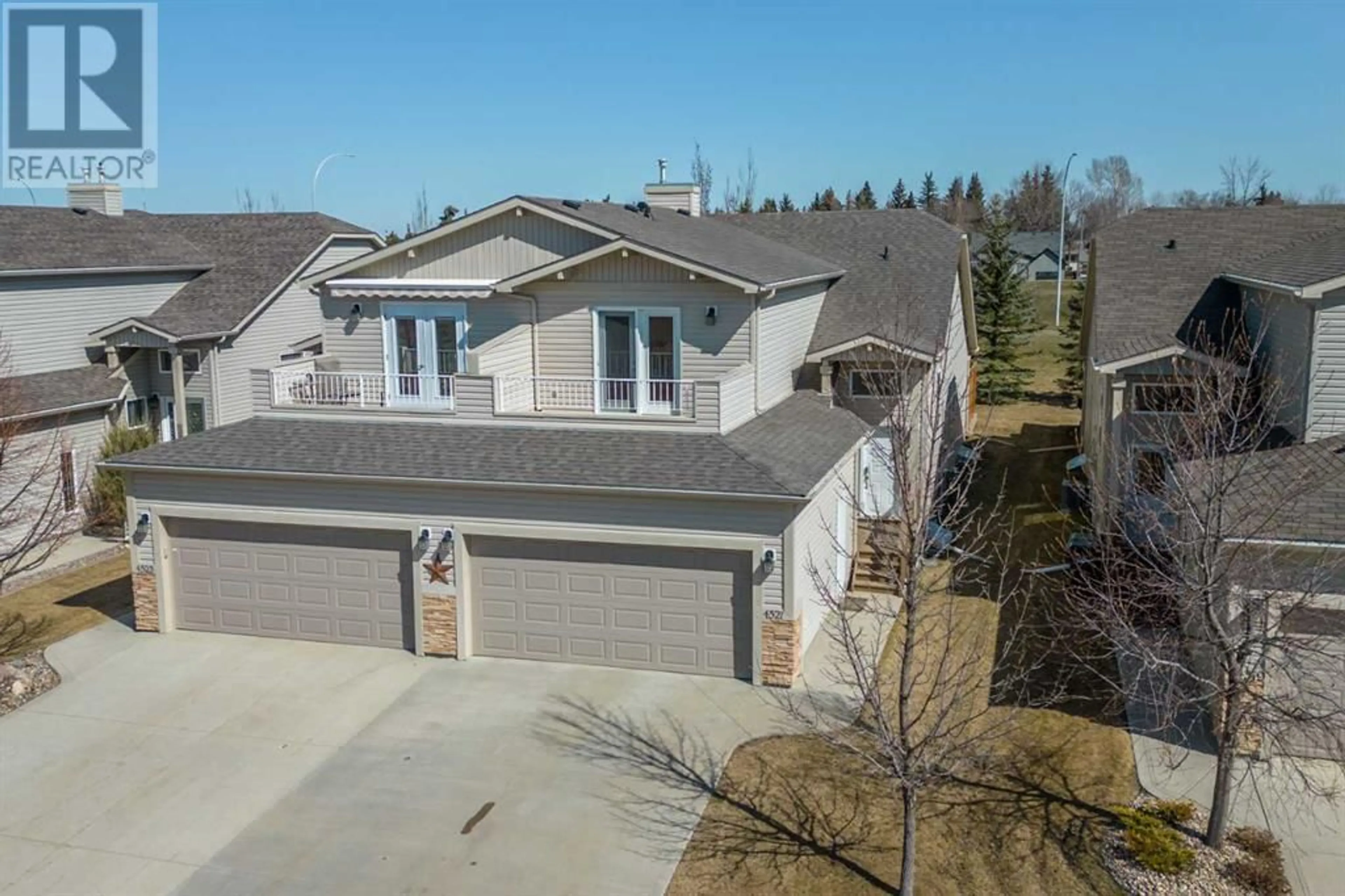 Frontside or backside of a home for 4521 69 Street, Camrose Alberta T4V5B3