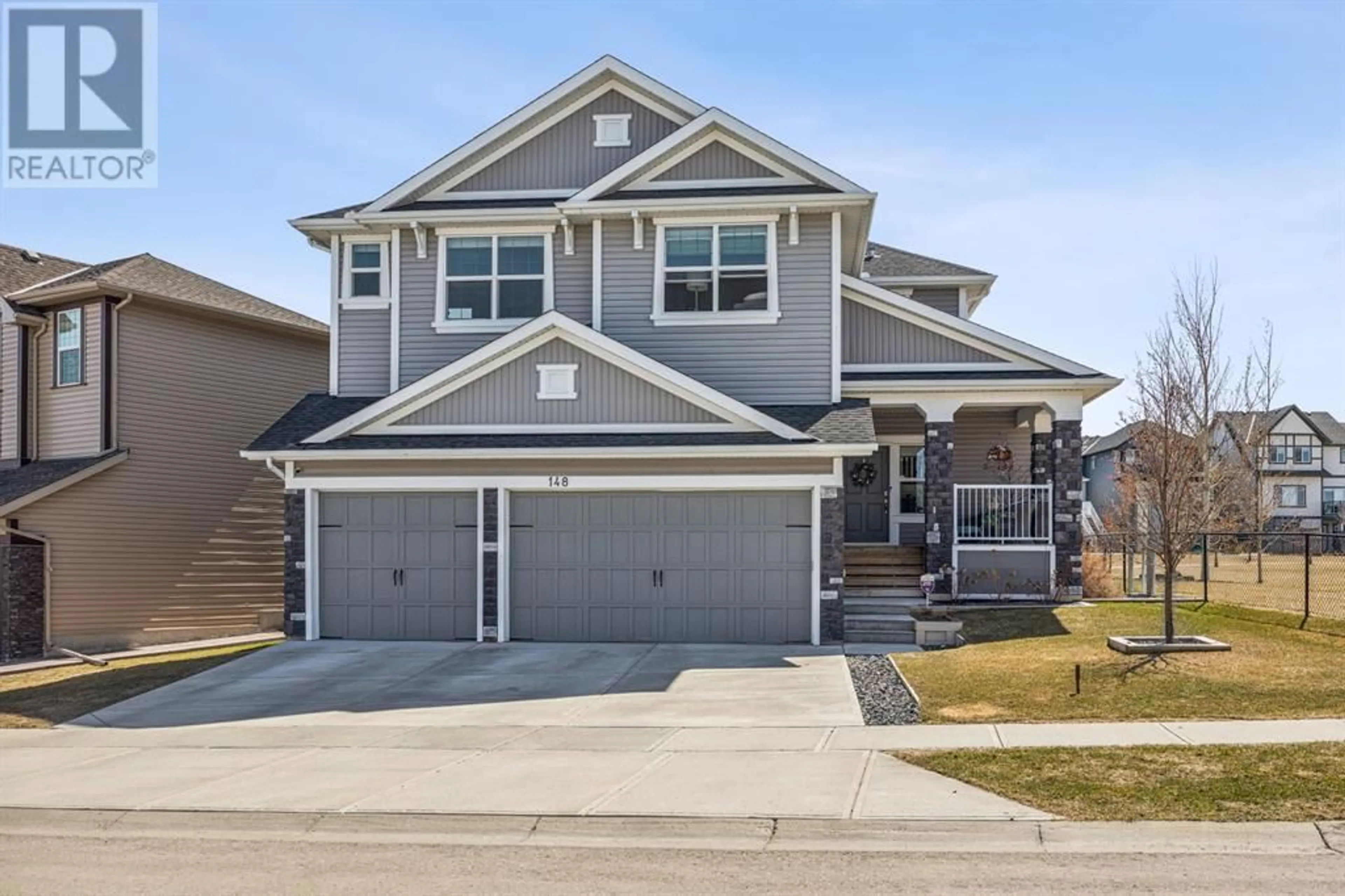 Frontside or backside of a home for 148 Hillcrest Drive SW, Airdrie Alberta T4B4B1