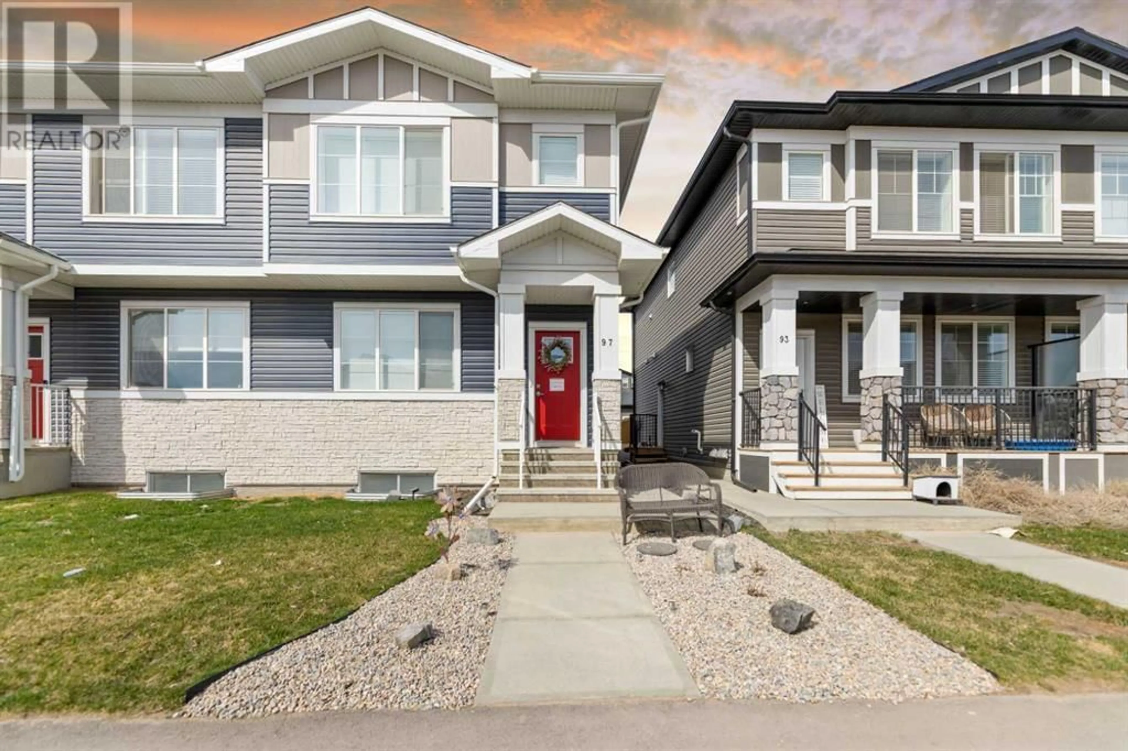 Frontside or backside of a home for 97 Creekstone Drive SW, Calgary Alberta T2X4Y2