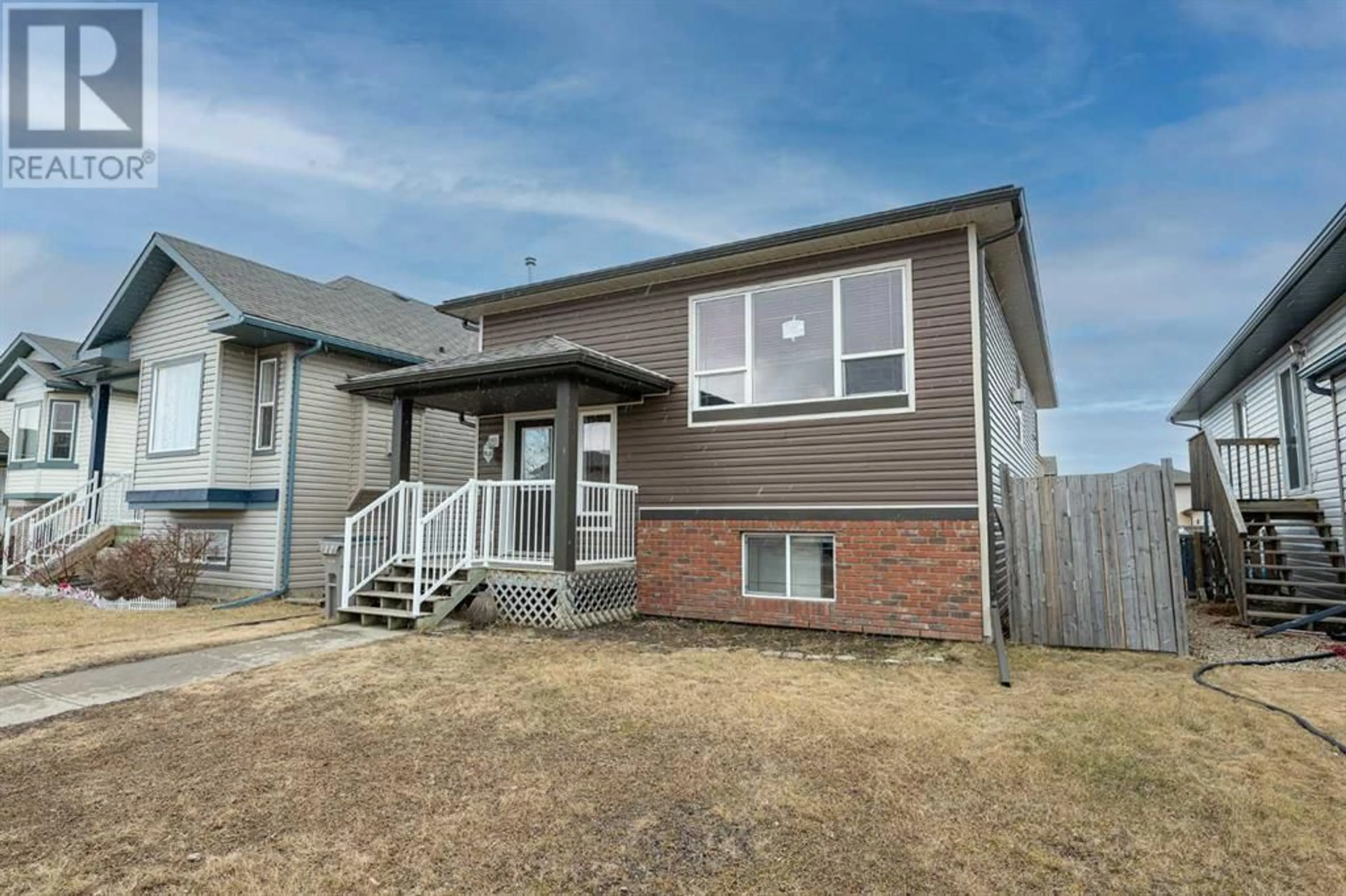 Frontside or backside of a home for 8925 70 Avenue, Grande Prairie Alberta T8X0C1