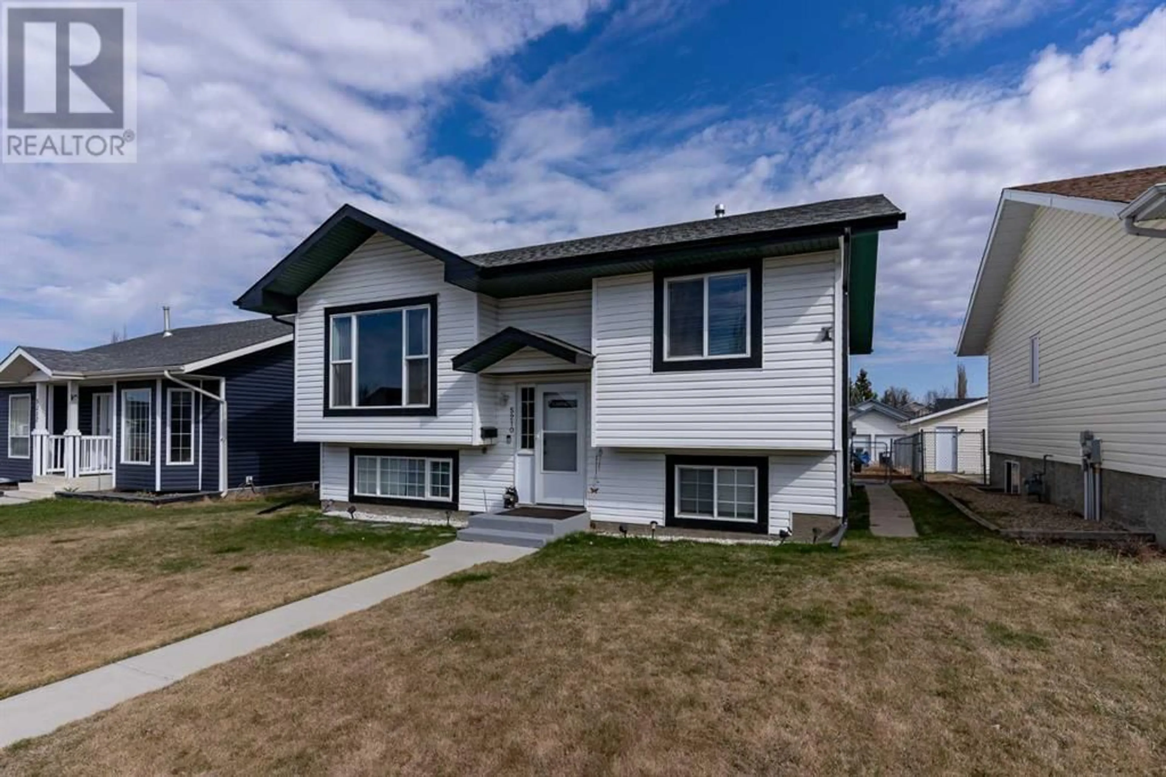 Frontside or backside of a home for 5210 41 Street Crescent, Innisfail Alberta T4G1W5