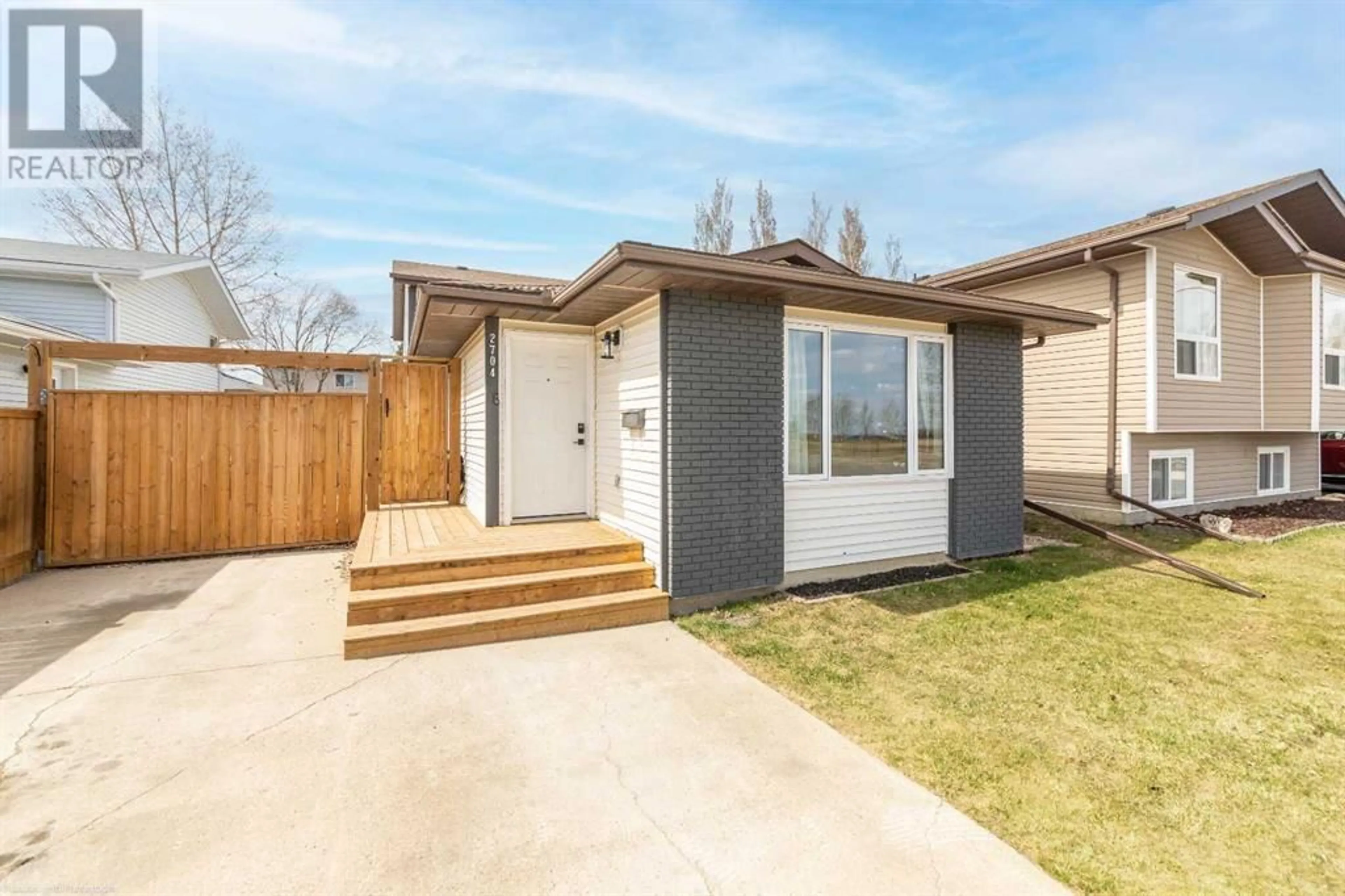 Frontside or backside of a home for 2704 45 Avenue, Lloydminster Saskatchewan S9V1T1