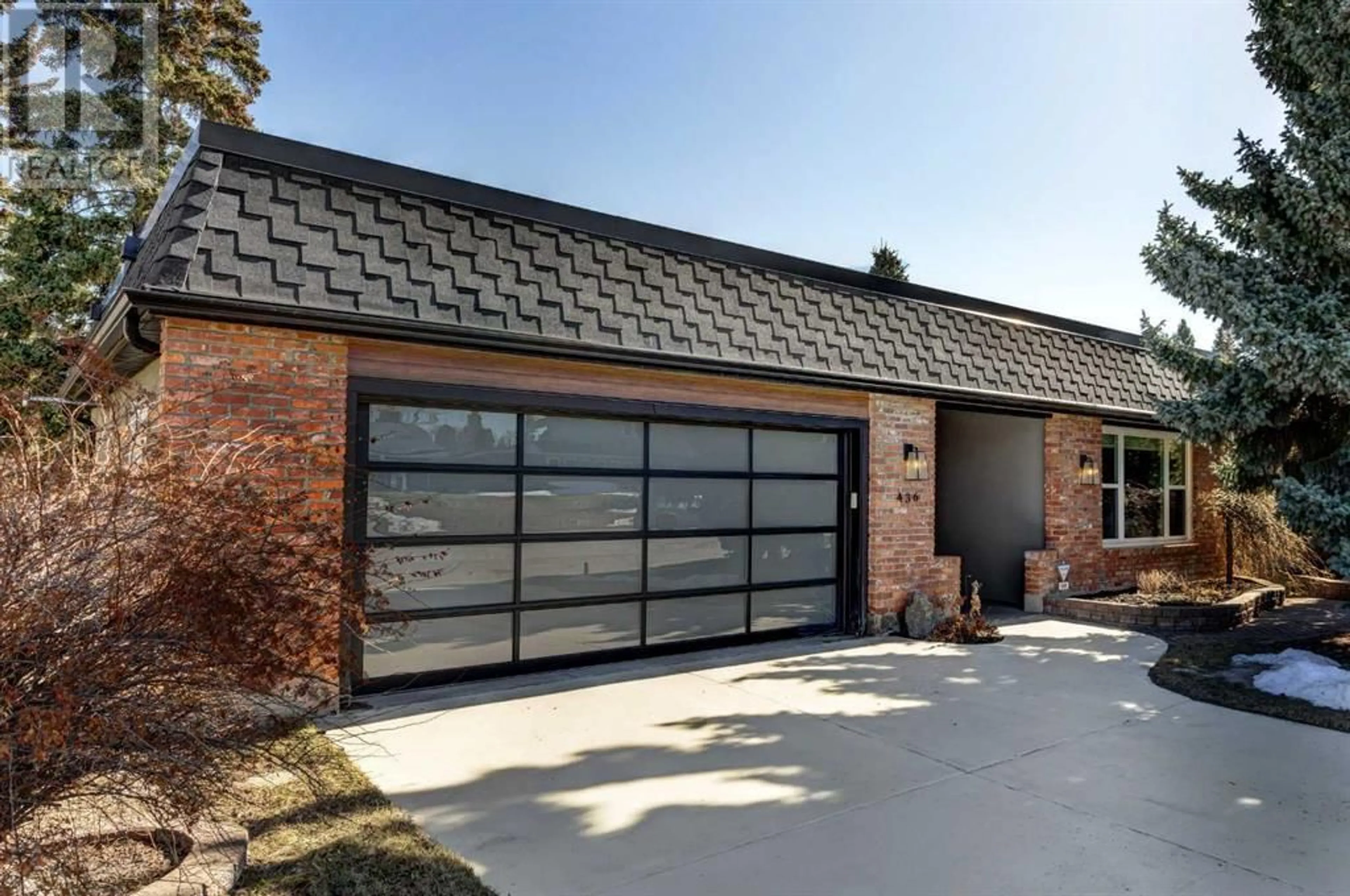 Home with brick exterior material for 436 Wilverside Way SE, Calgary Alberta T2J1Z7