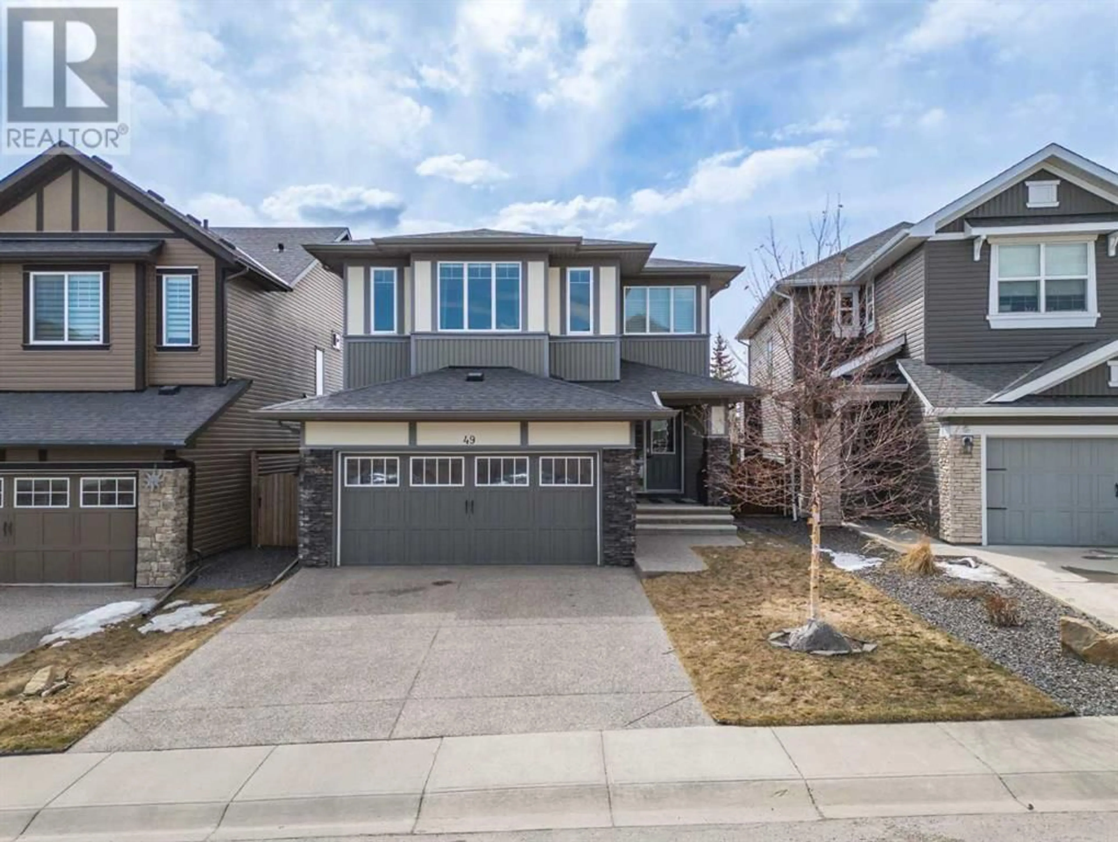 Frontside or backside of a home for 49 Cougar Ridge Close SW, Calgary Alberta T3H0V4