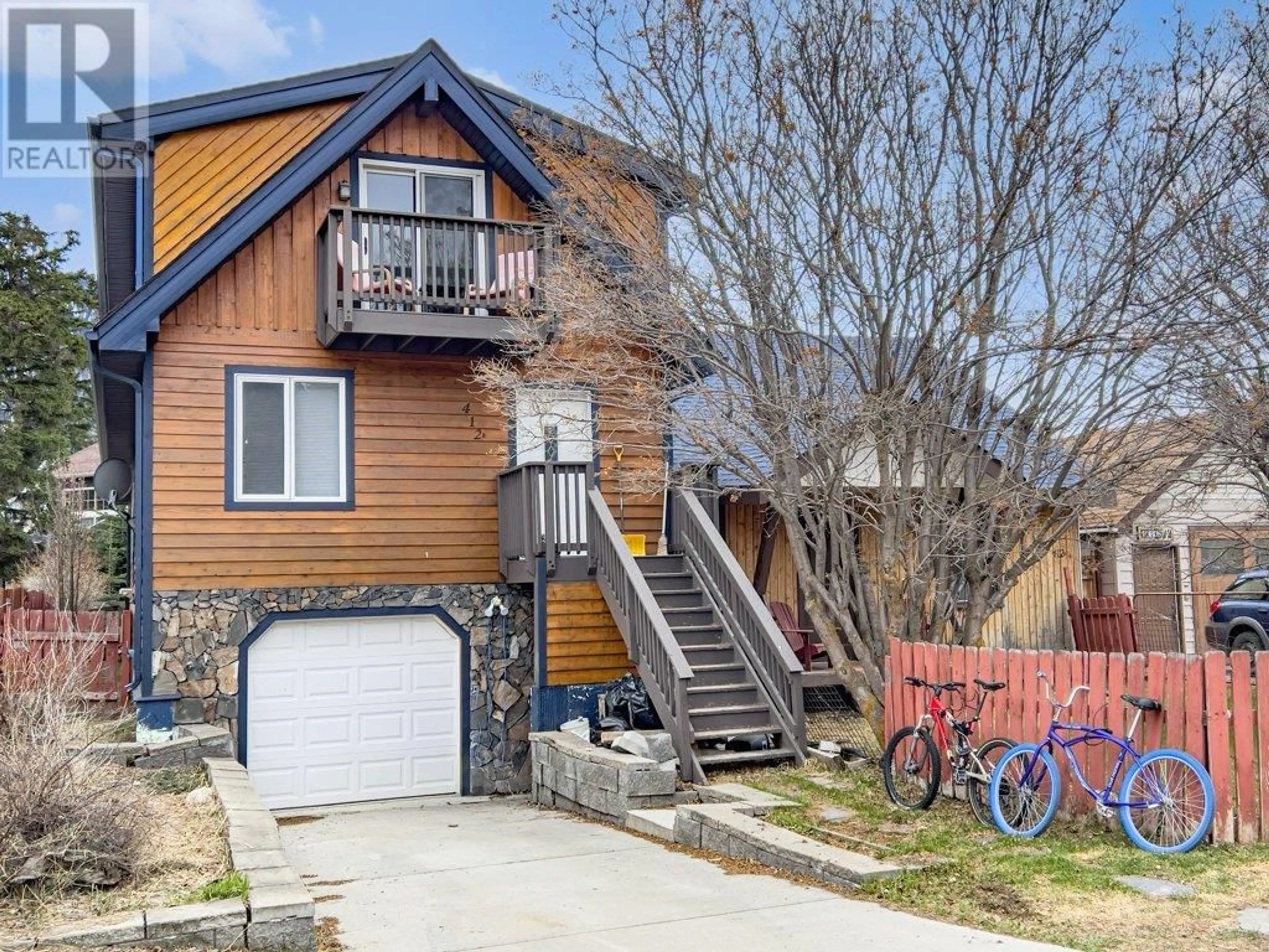 Frontside or backside of a home for 412 Cougar Street, Banff Alberta T1L1A1