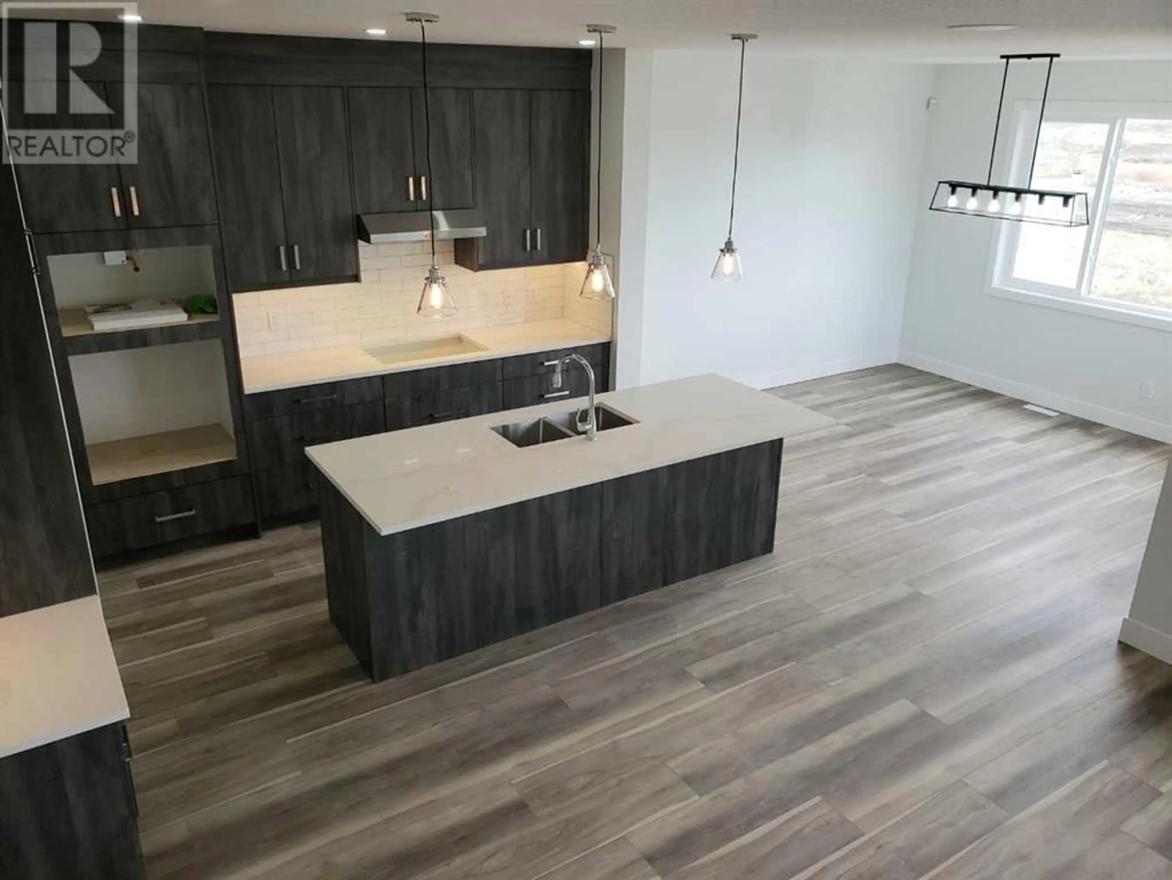 Contemporary kitchen for 1409 Aldrich Place, Carstairs Alberta T0M0N0