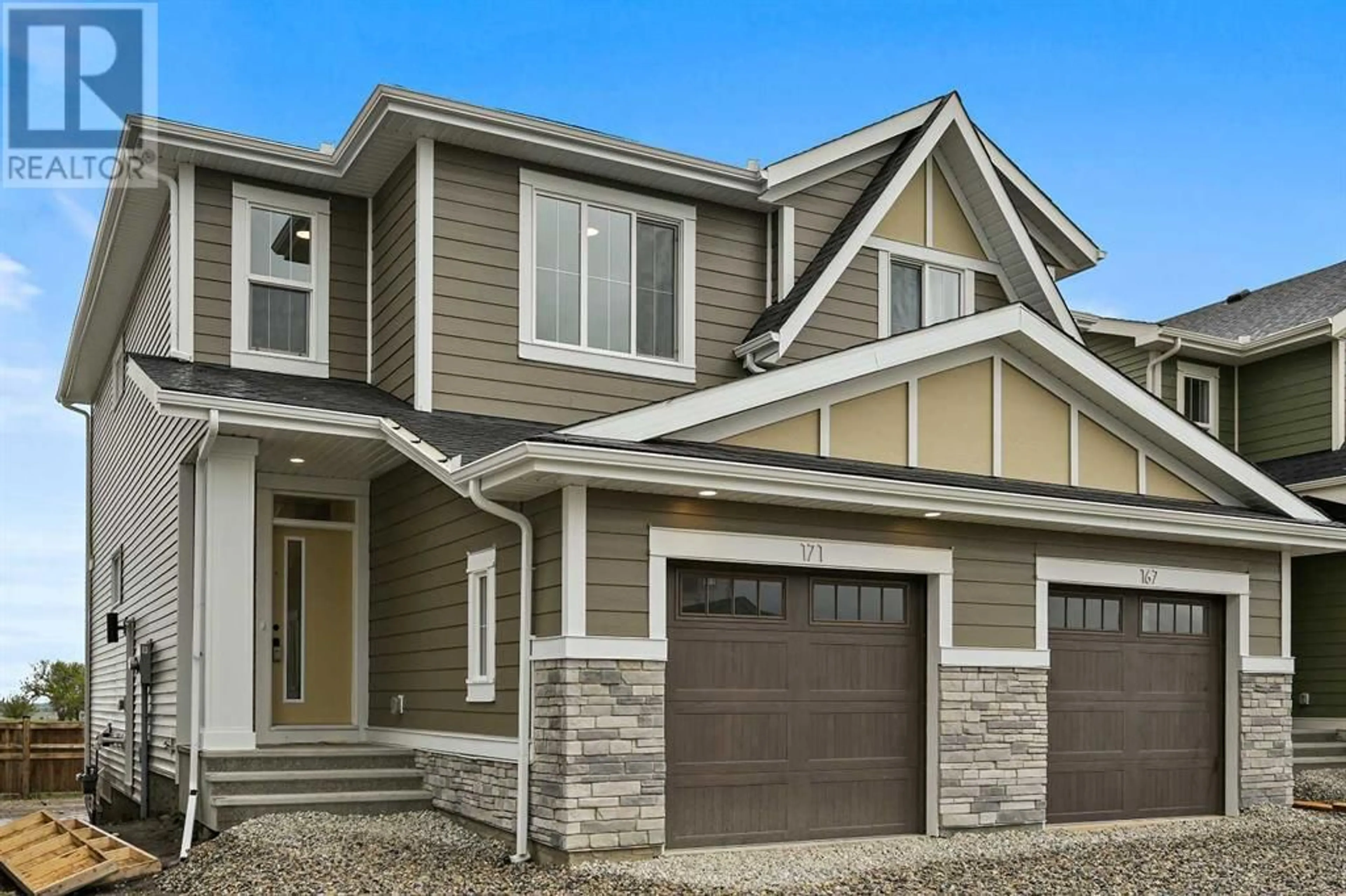 Home with vinyl exterior material for 171 Creekstone Way SW, Calgary Alberta T2X4P9