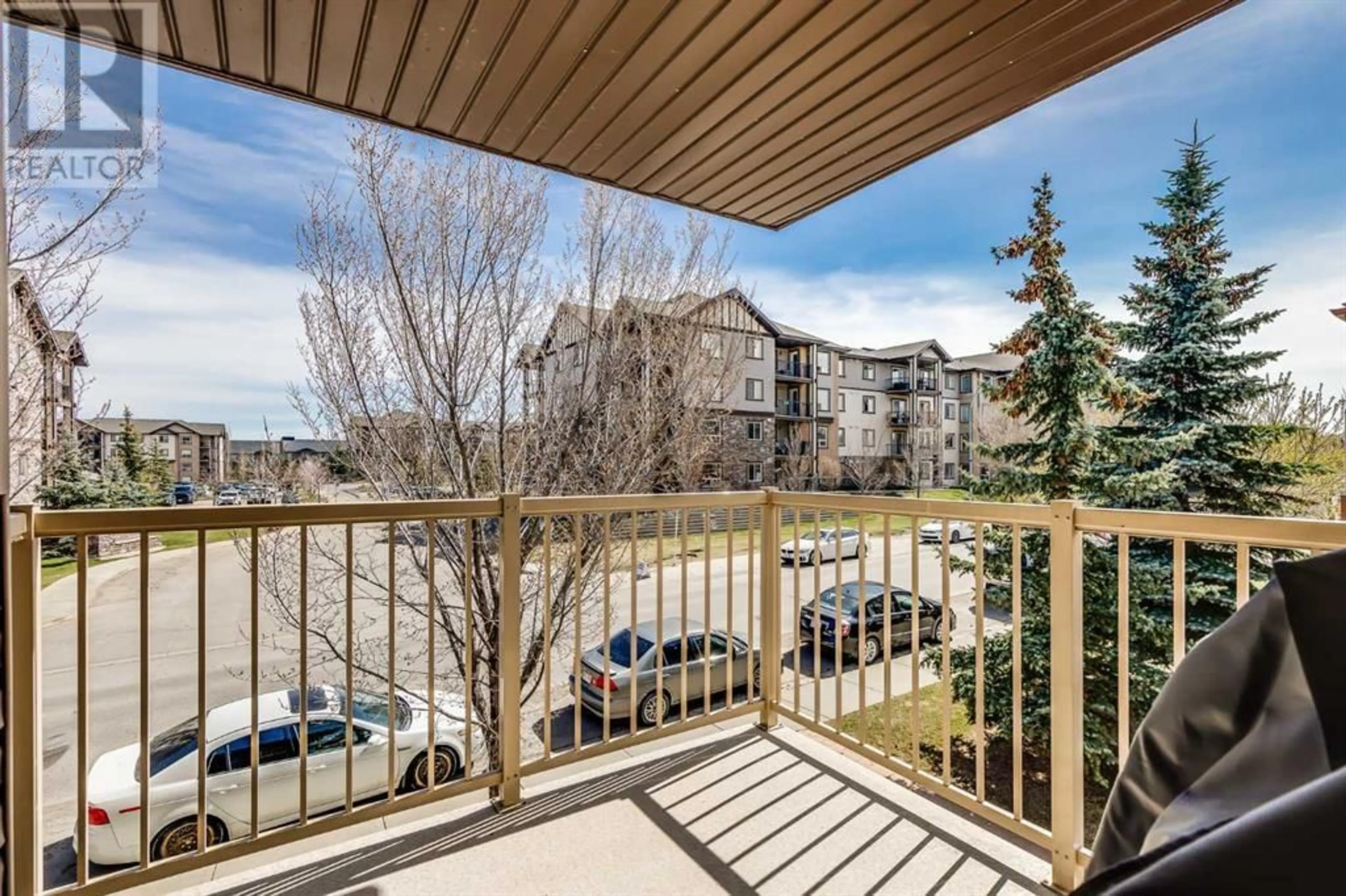 A pic from exterior of the house or condo for 206 40 Panatella Landing NW, Calgary Alberta T3K0K8