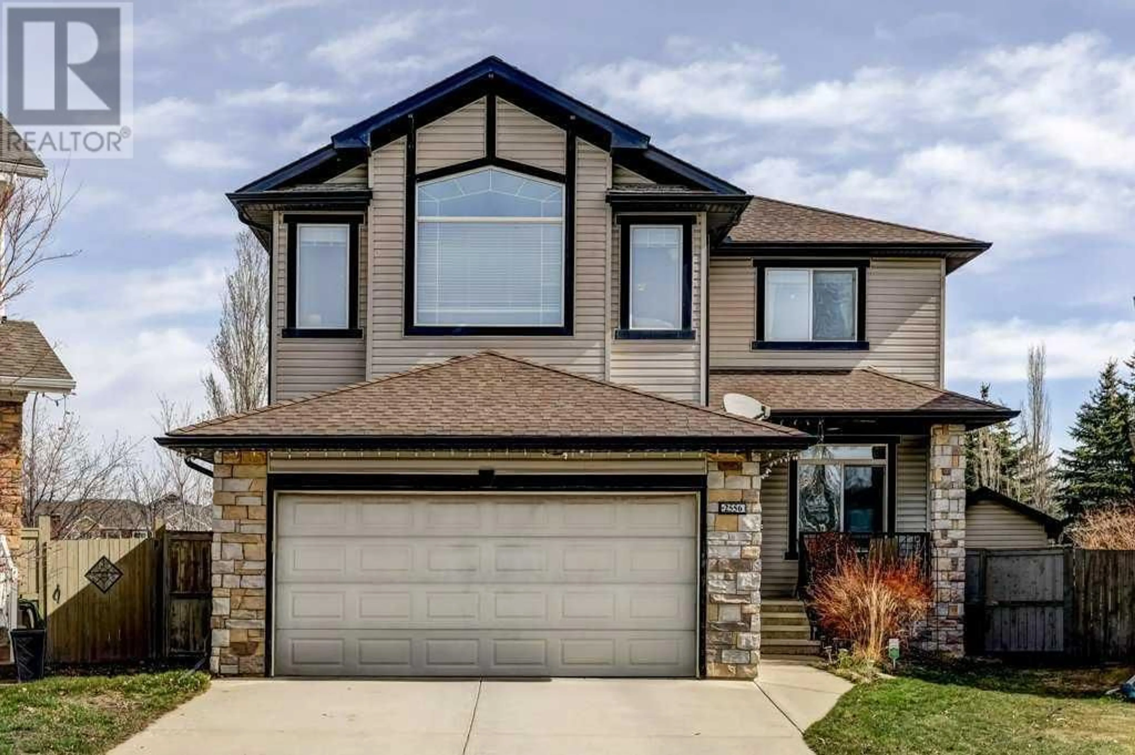 Frontside or backside of a home for 2556 Coopers Circle SW, Airdrie Alberta T4B3B7