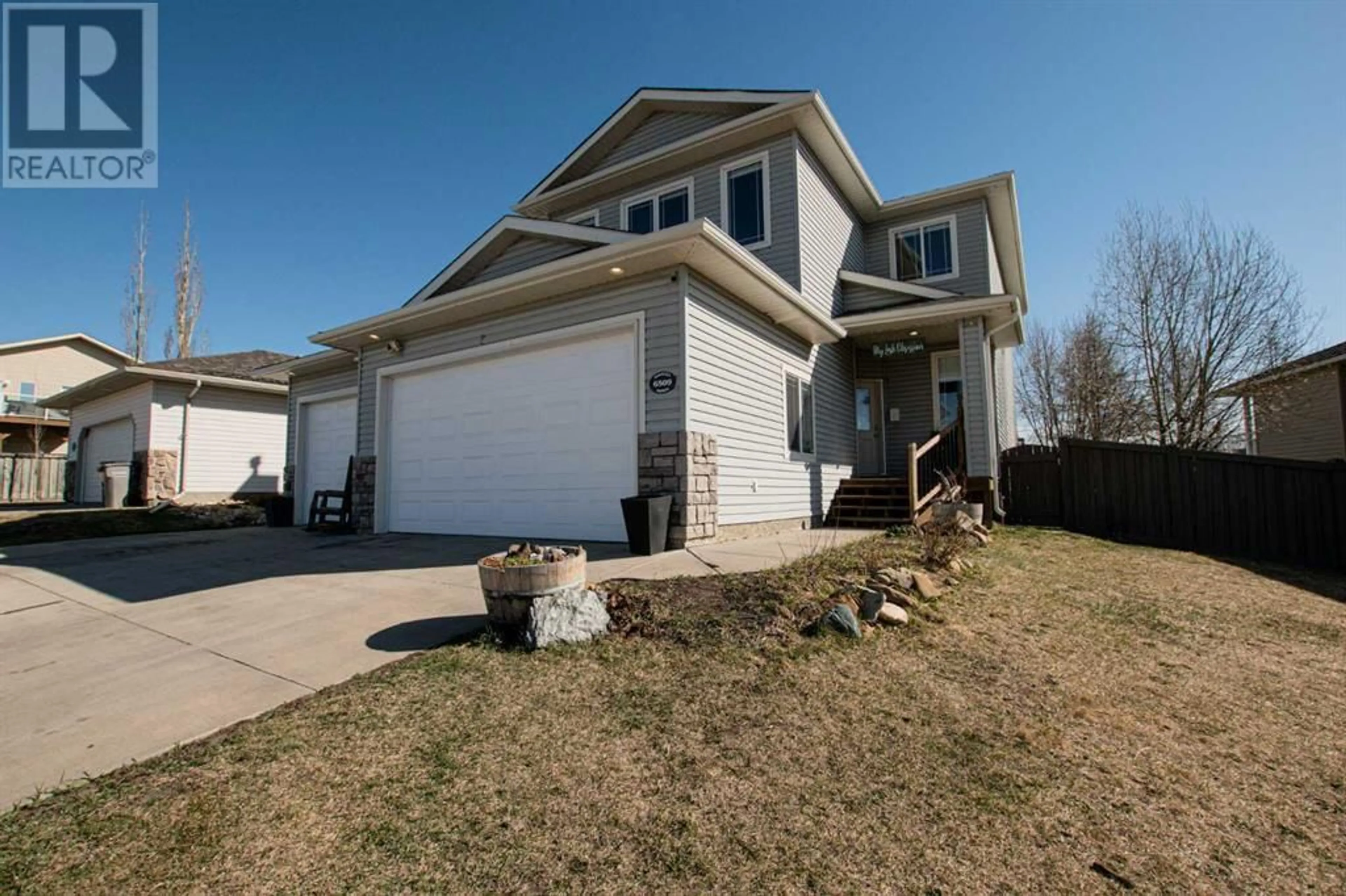 Frontside or backside of a home for 6509 111A Street, Grande Prairie Alberta T8W0C1