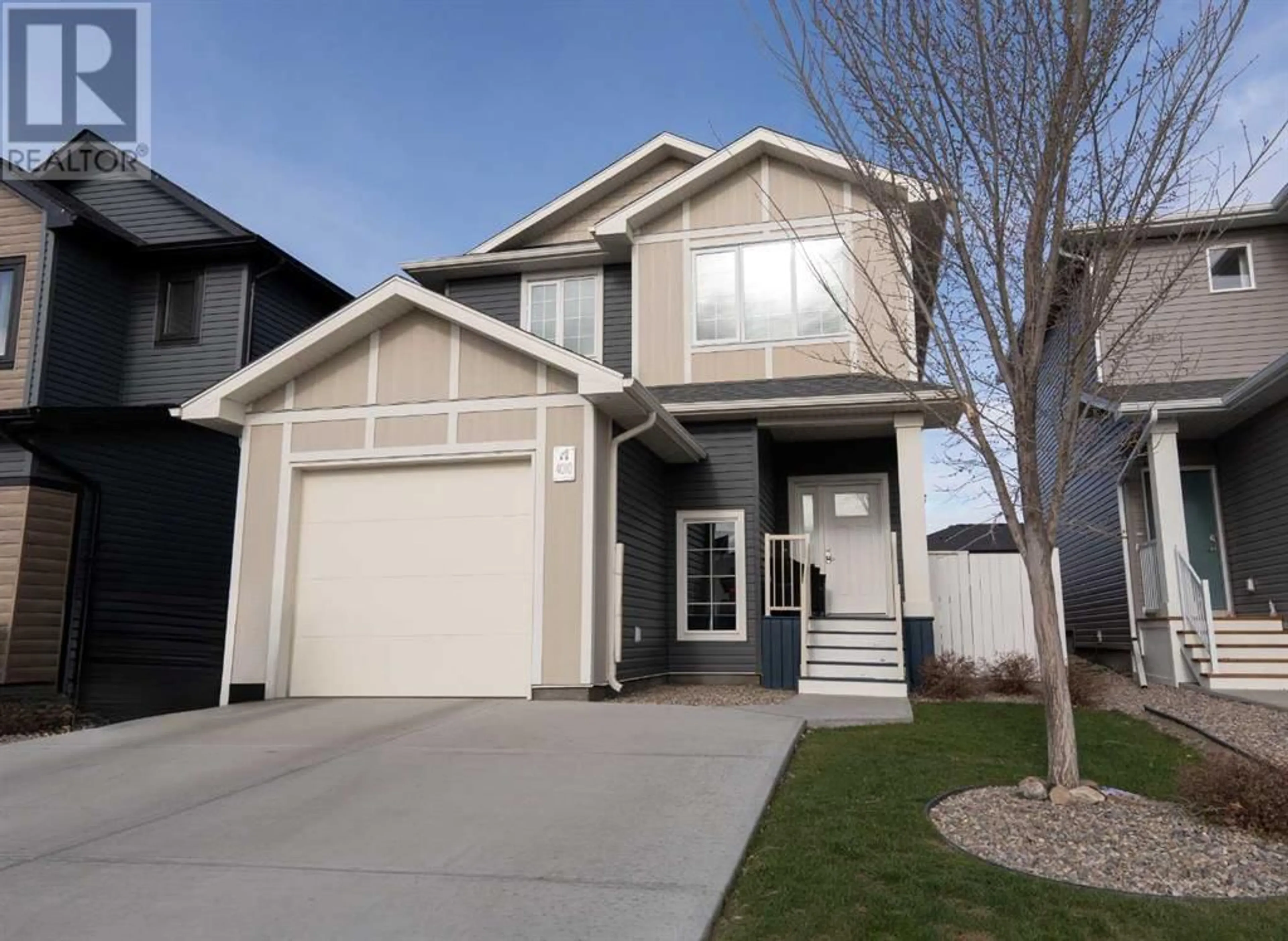 Frontside or backside of a home for 4010 10 Street N, Lethbridge Alberta T1H7G9