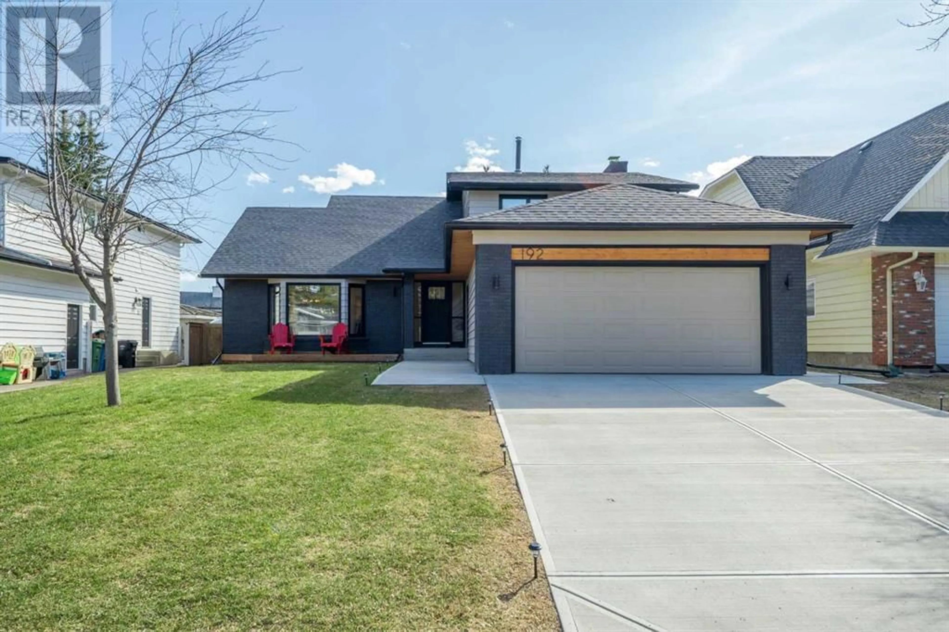 Frontside or backside of a home for 192 Canterville Drive SW, Calgary Alberta T2W3X2