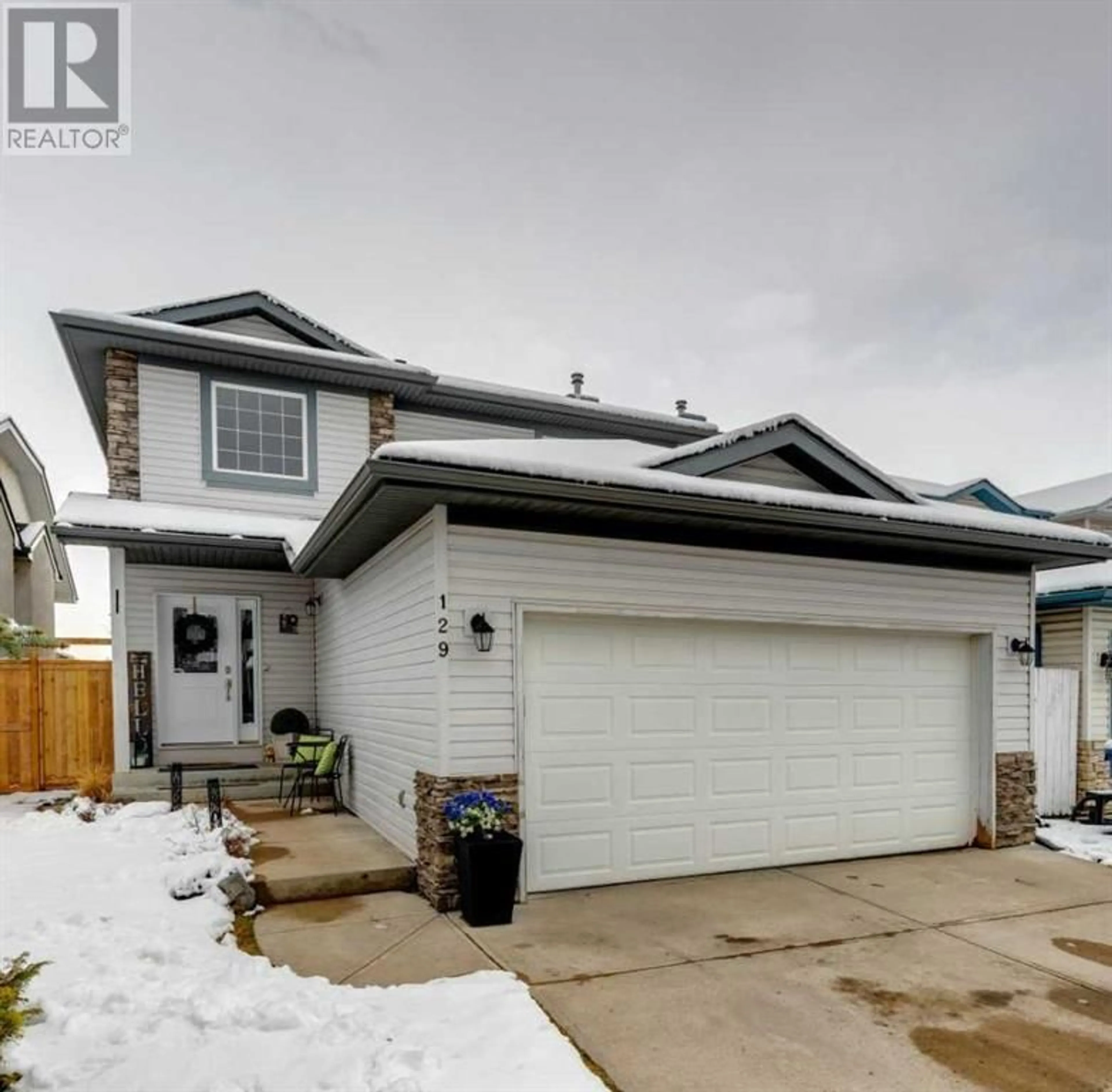 Frontside or backside of a home for 129 Douglas Ridge Circle SE, Calgary Alberta T2Z3C2