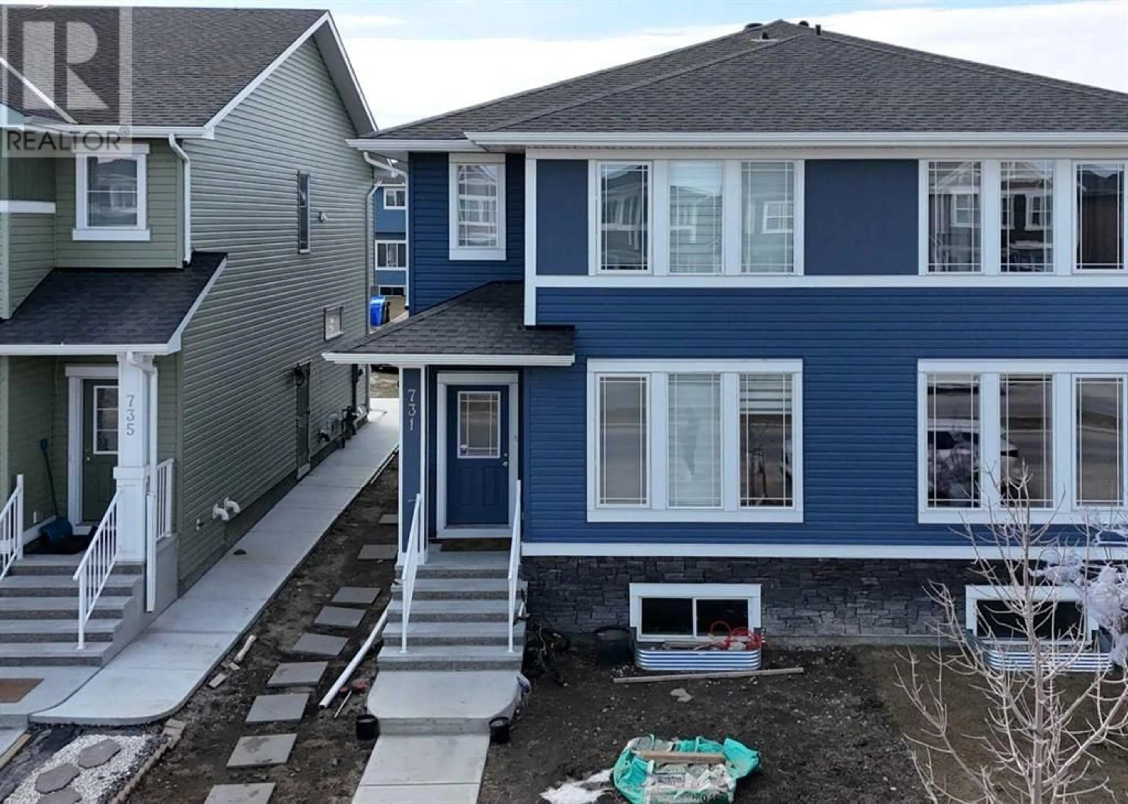 Frontside or backside of a home for 731 Redstone Drive, Calgary Alberta T3N1K9